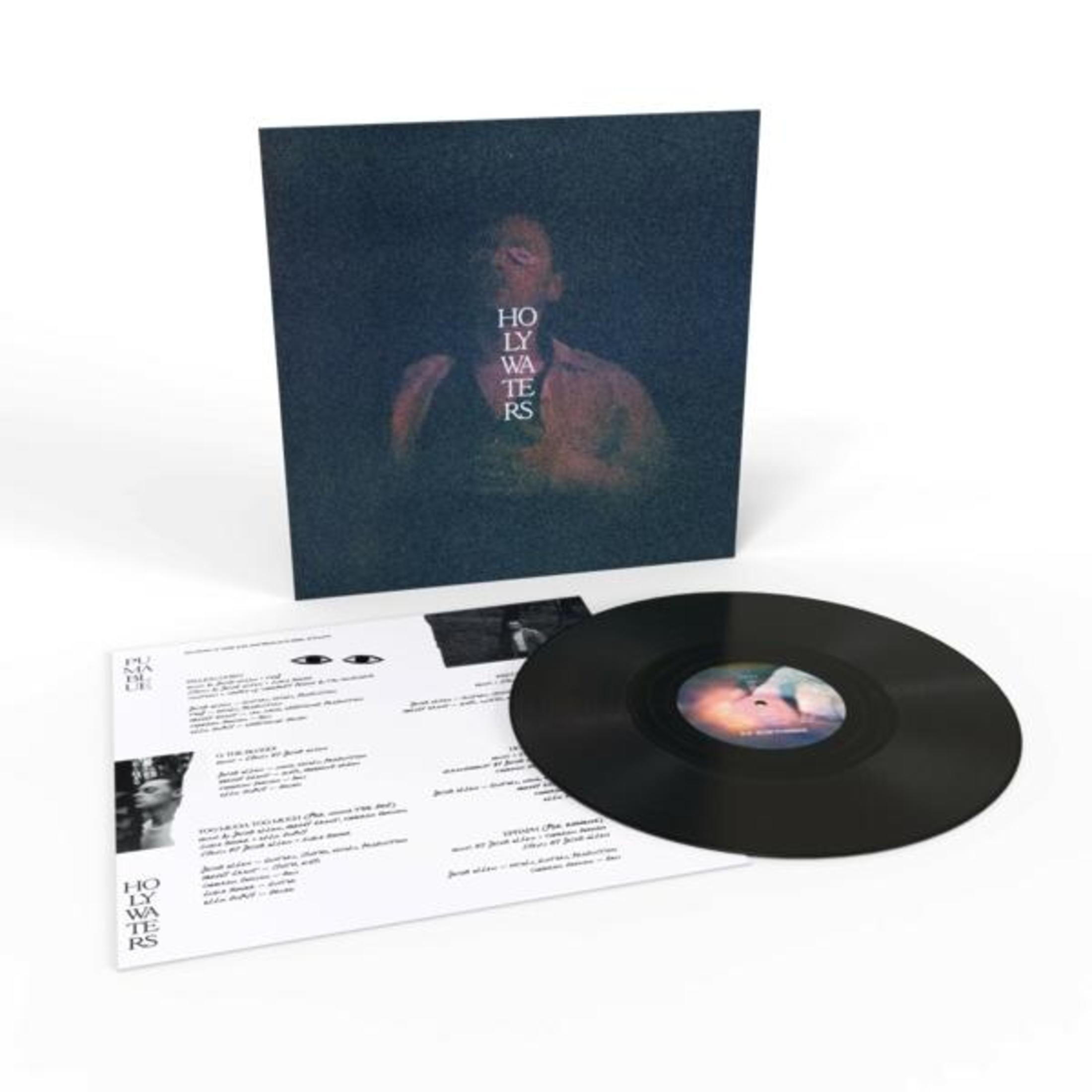 Disco in vinile con copertina e note