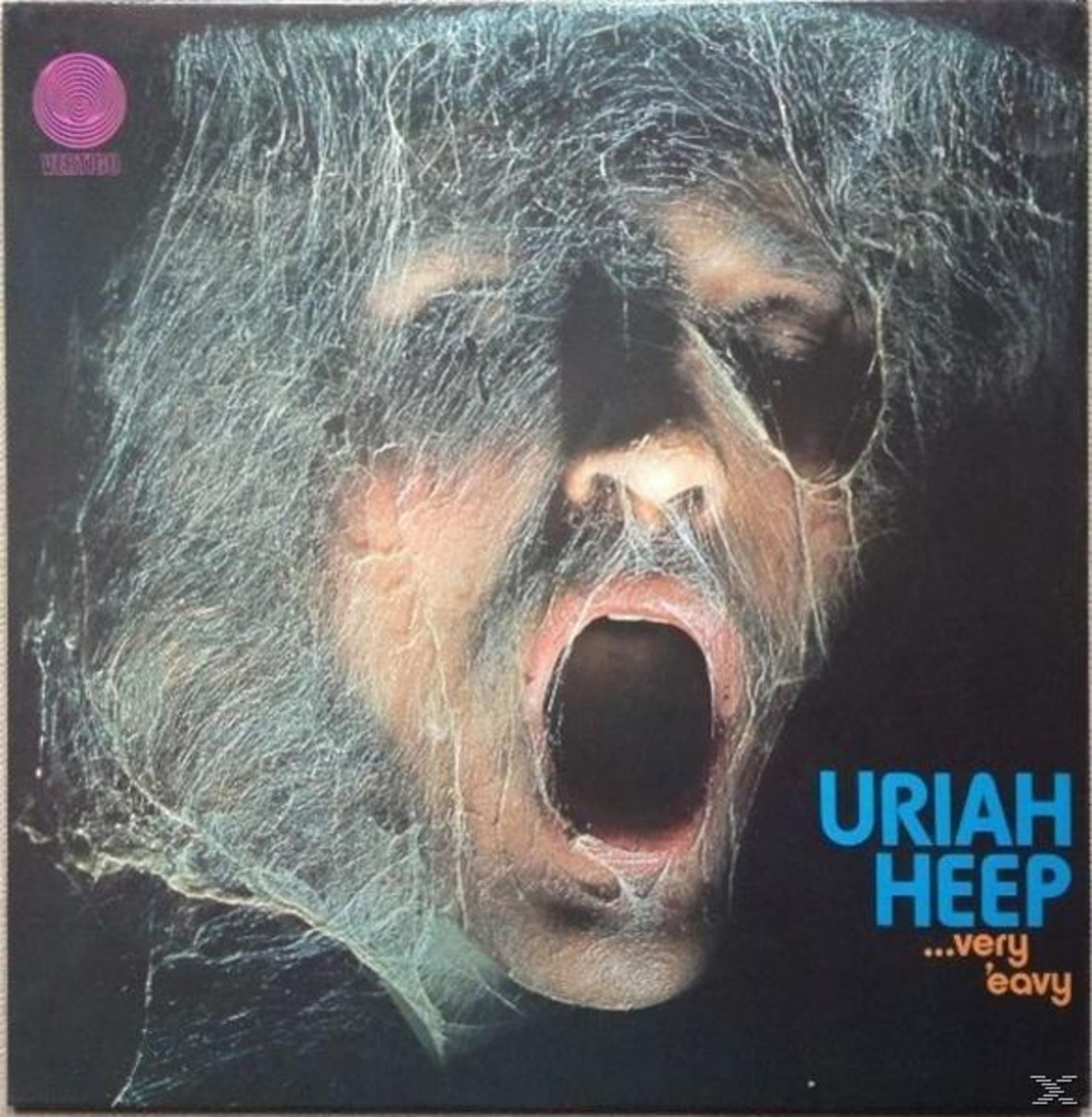 Copertina album Uriah Heep: Uomo con bocca aperta, coperto di ragnatele.