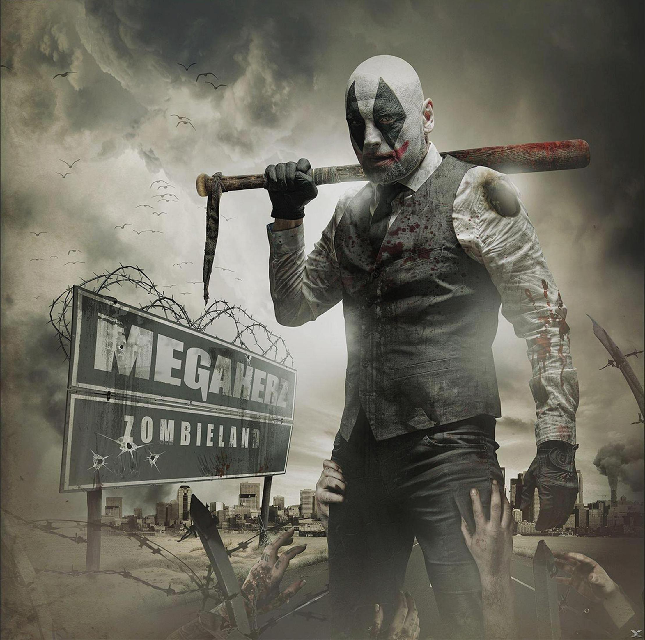 Uomo con mazza da baseball e trucco da clown davanti a un cartello "Megahere Zombieland".
