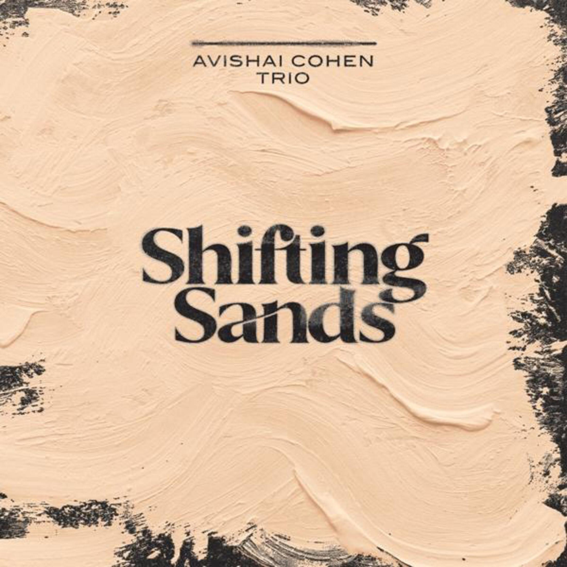 Copertina album Avishai Cohen Trio: Shifting Sands su sfondo beige.