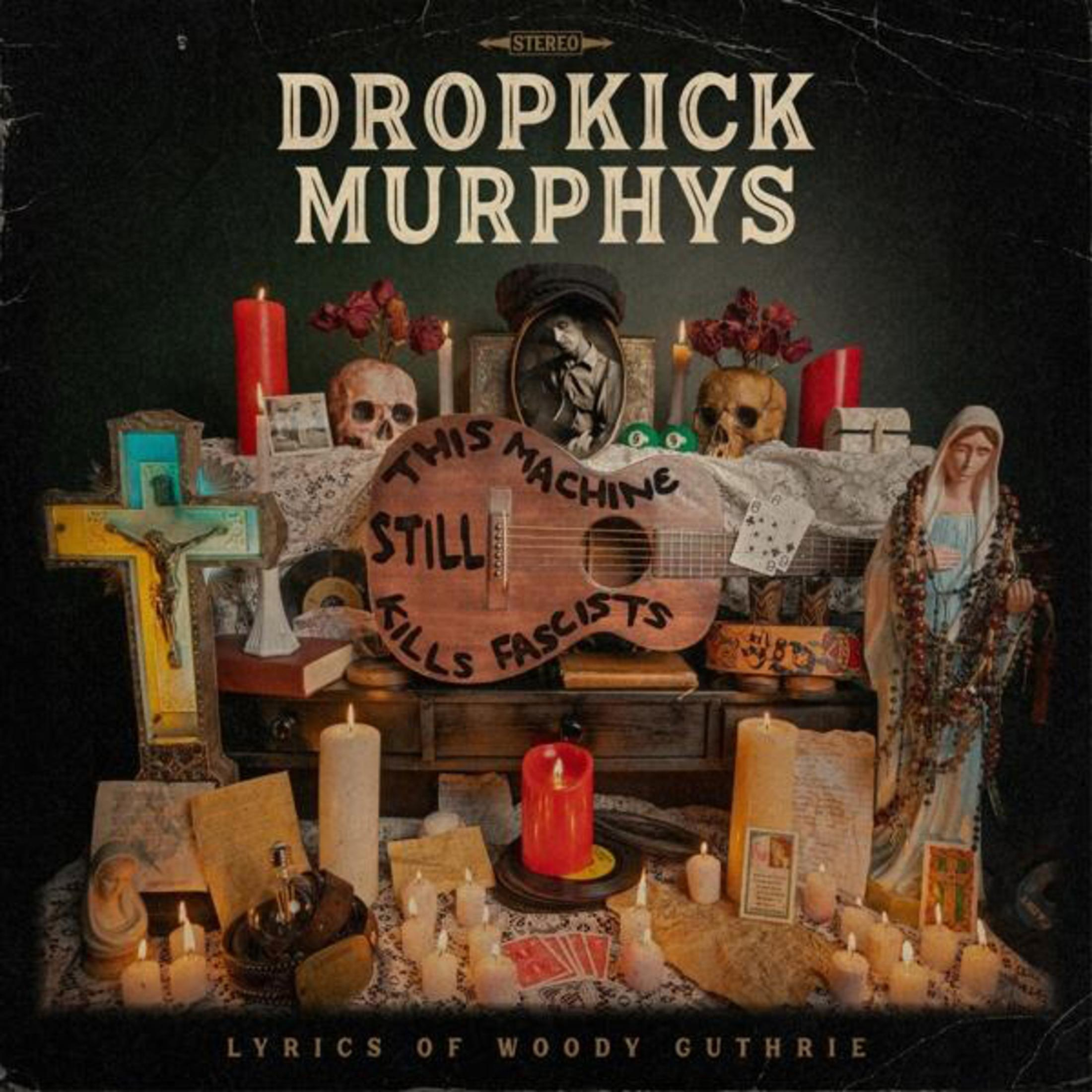 Copertina album Dropkick Murphys con chitarra, candele, teschi e simboli religiosi.
