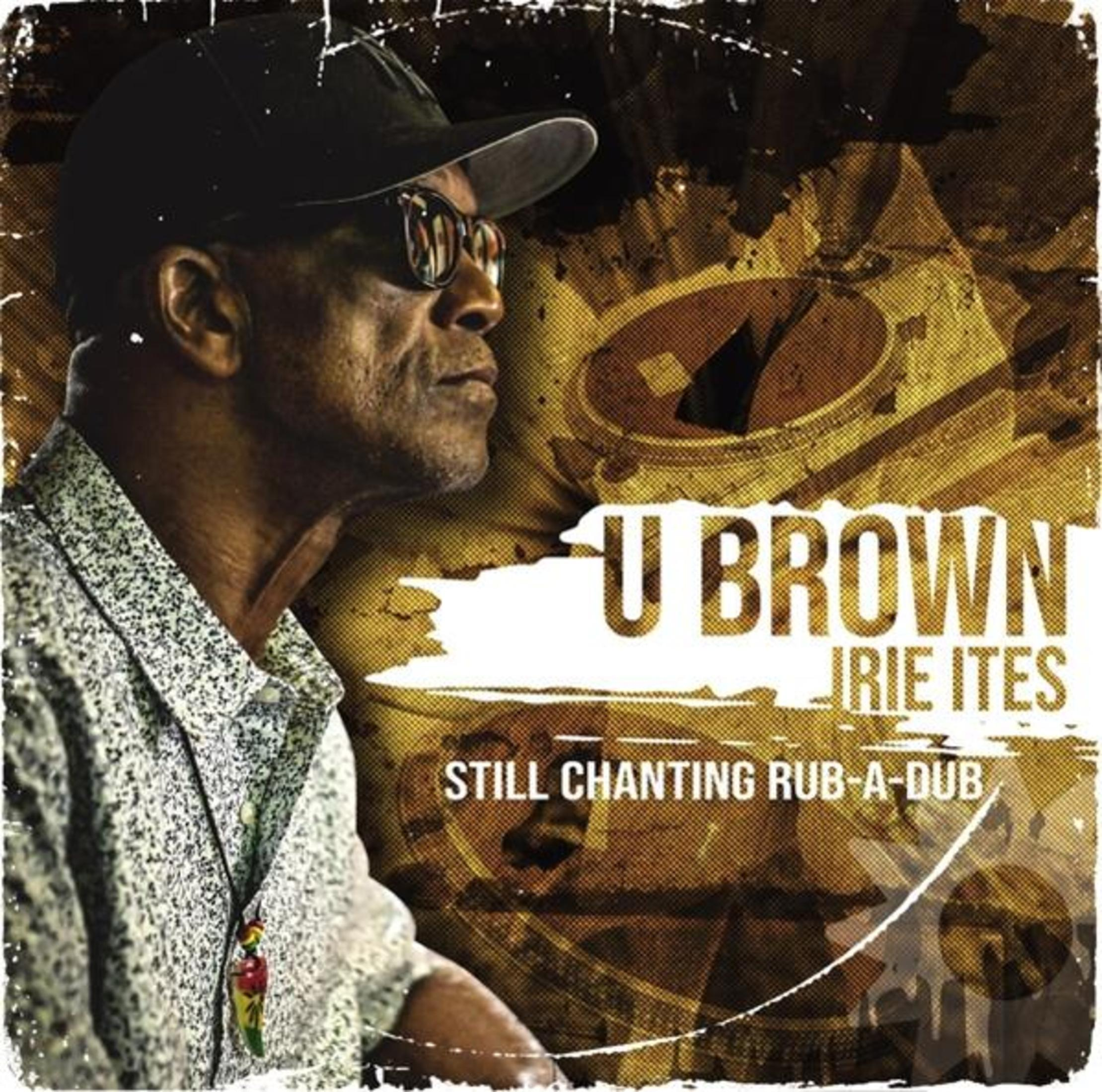 Uomo con cappello e occhiali, testo "U BROWN", motivo astratto.