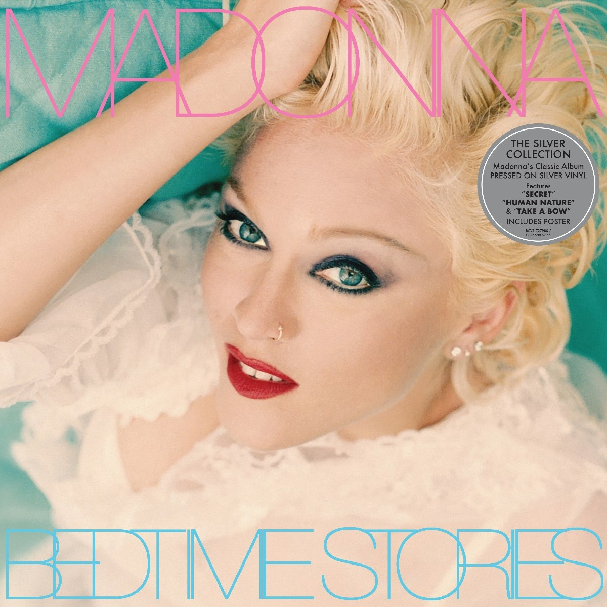 Madonna con capelli biondi e ombretto blu, copertina album.