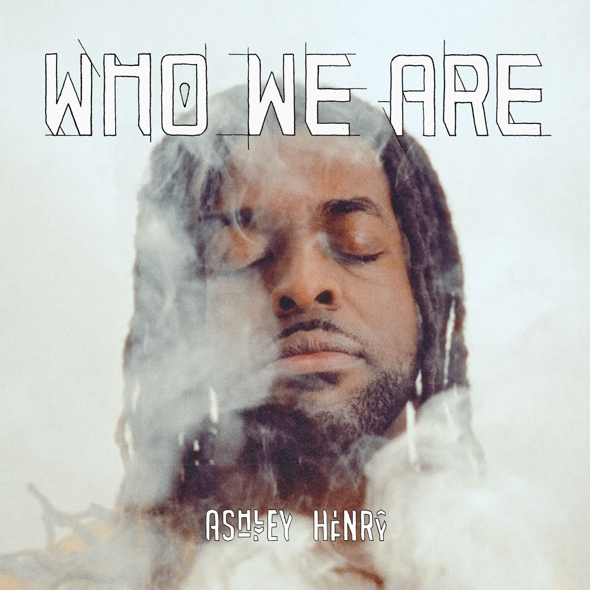 Uomo con occhi chiusi, fumo e testo 'WHO WE ARE'