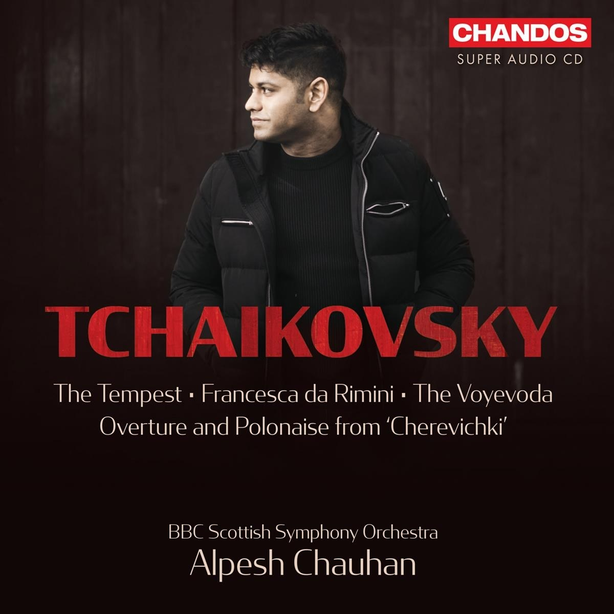 Un uomo guarda a sinistra, con titolo album Tchaikovsky e logo Chandos.