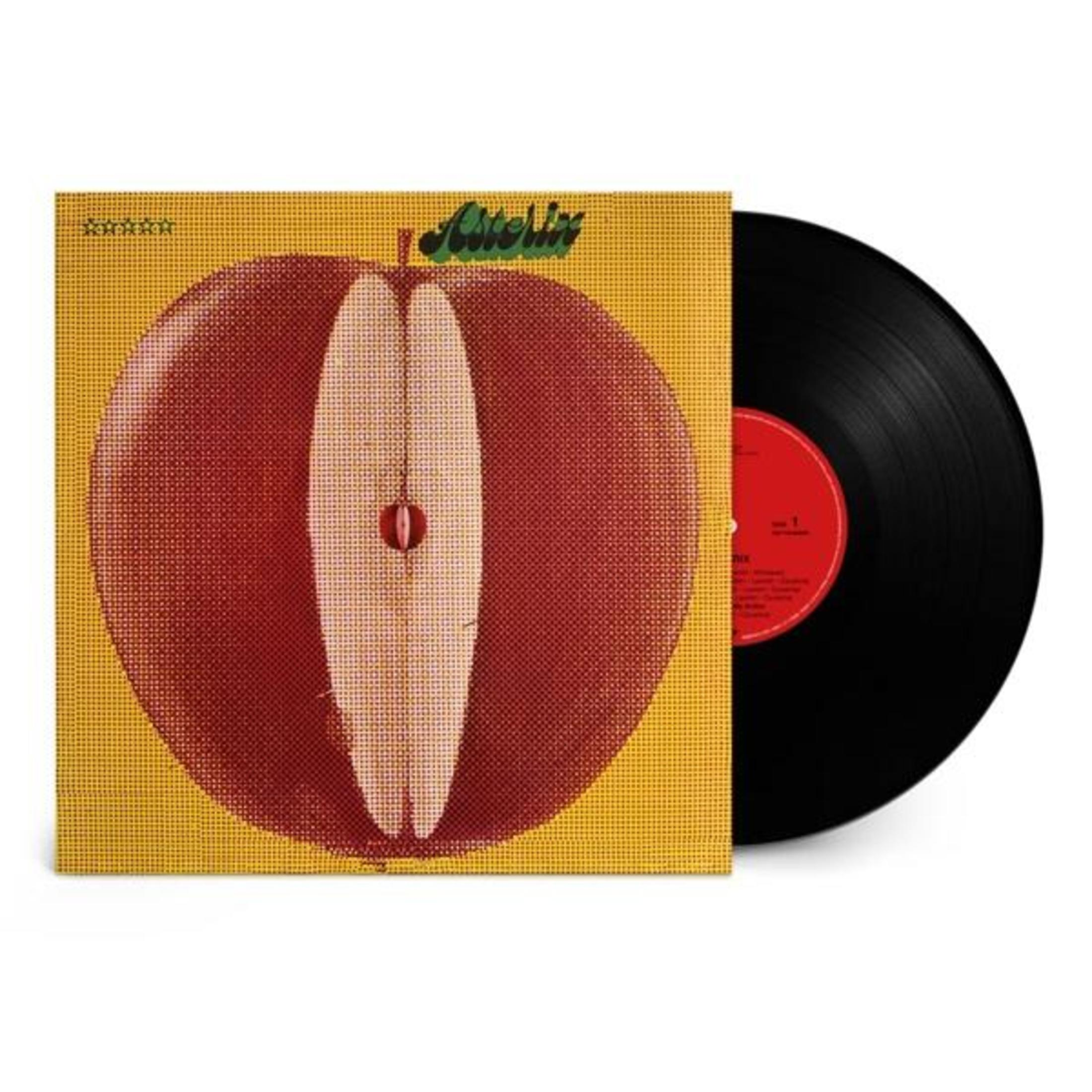 Disco in vinile con copertina: copertina gialla con mela tagliata rossa, disco nero accanto.