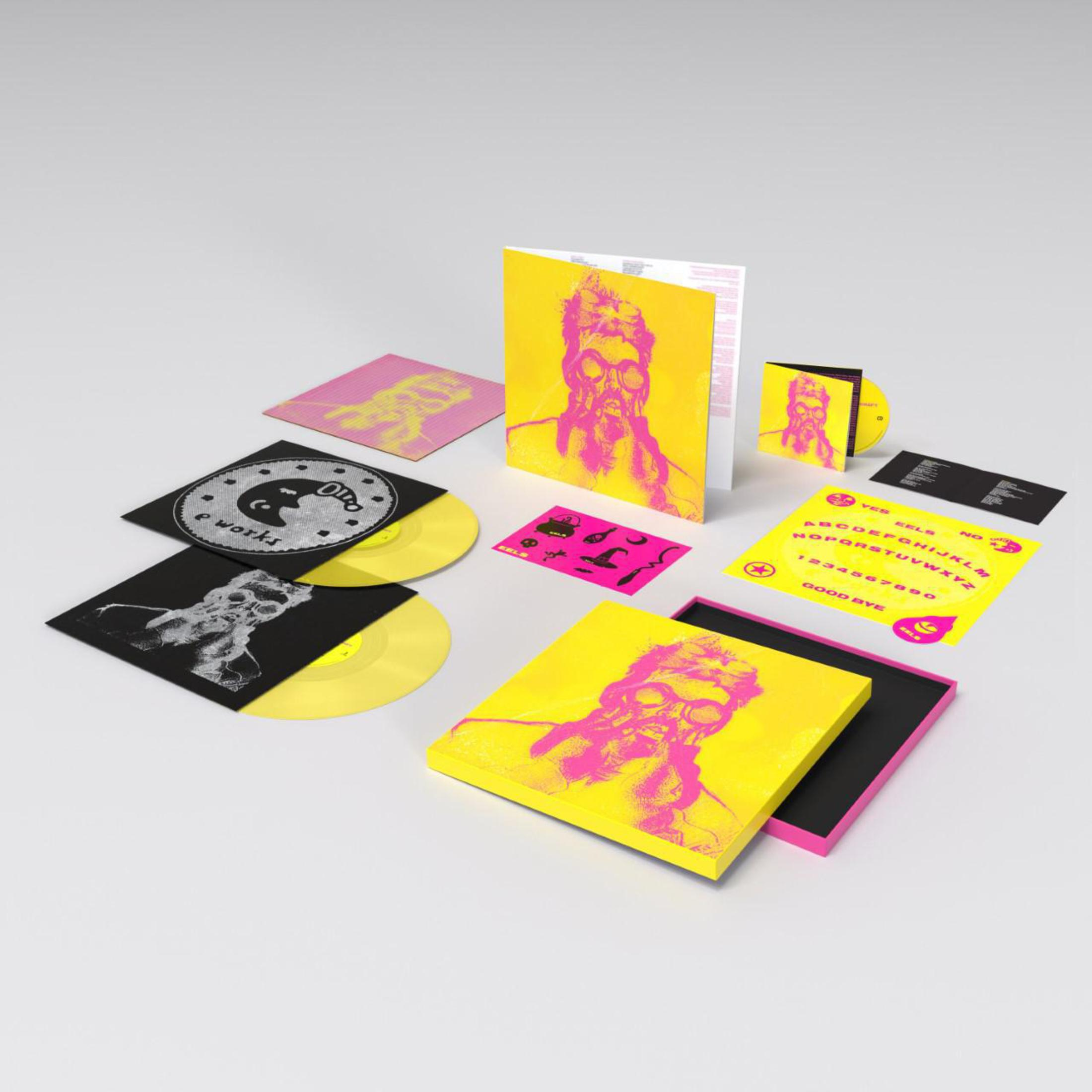 Un set di dischi in vinile e CD con artwork psichedelico giallo e rosa.