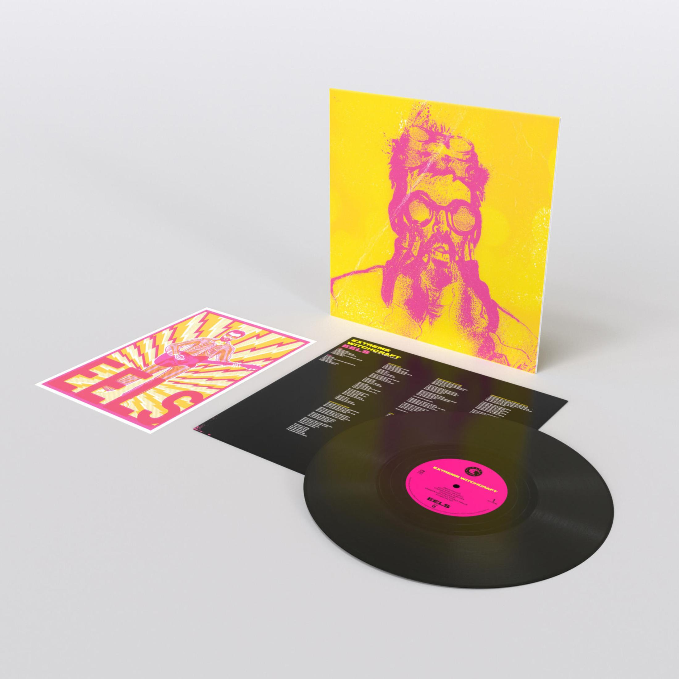 Disco in vinile nero con copertina e poster gialli e rosa.