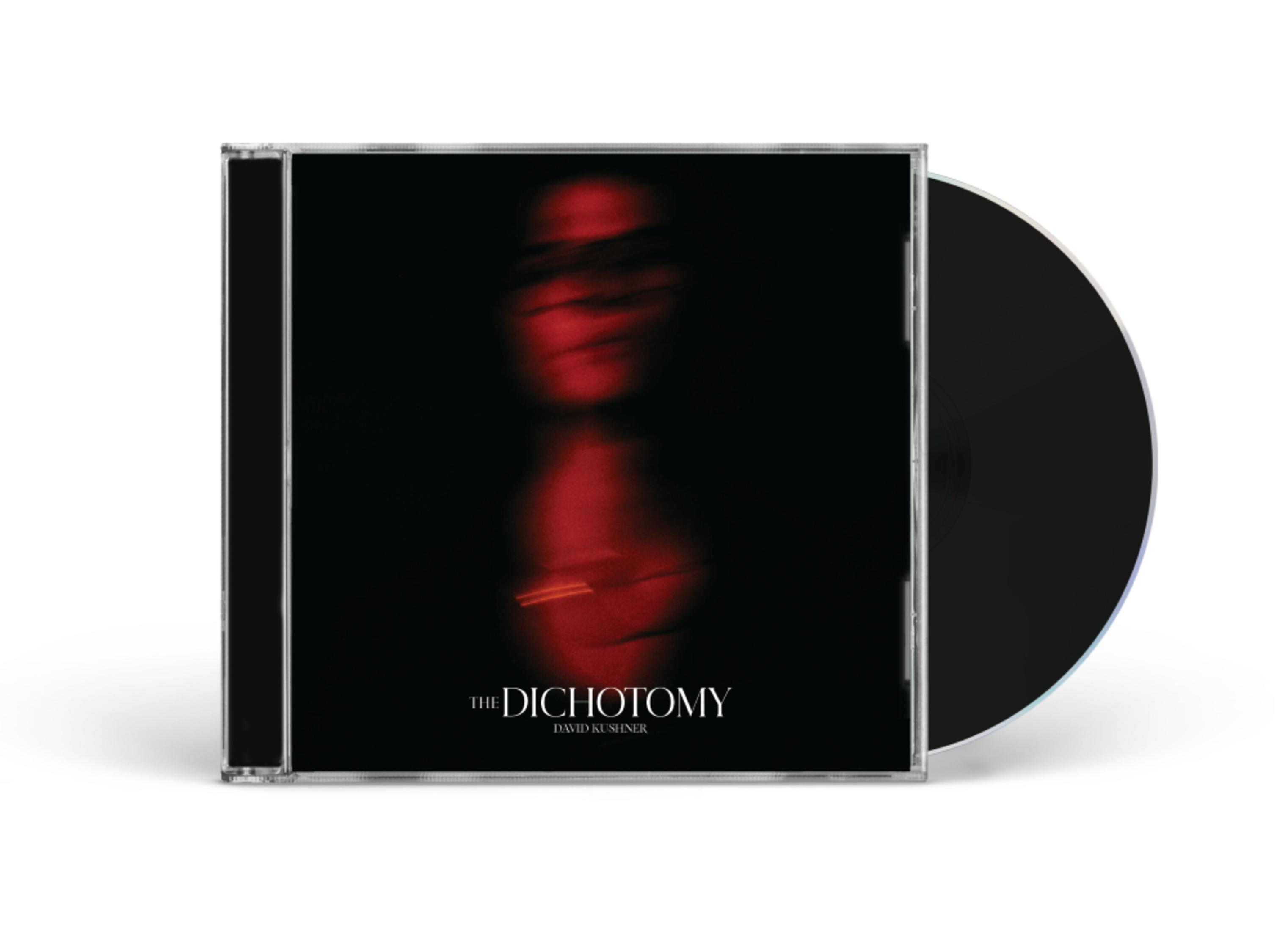 Custodia CD con sfondo nero, volto rosso e titolo 'The Dichotomy'.