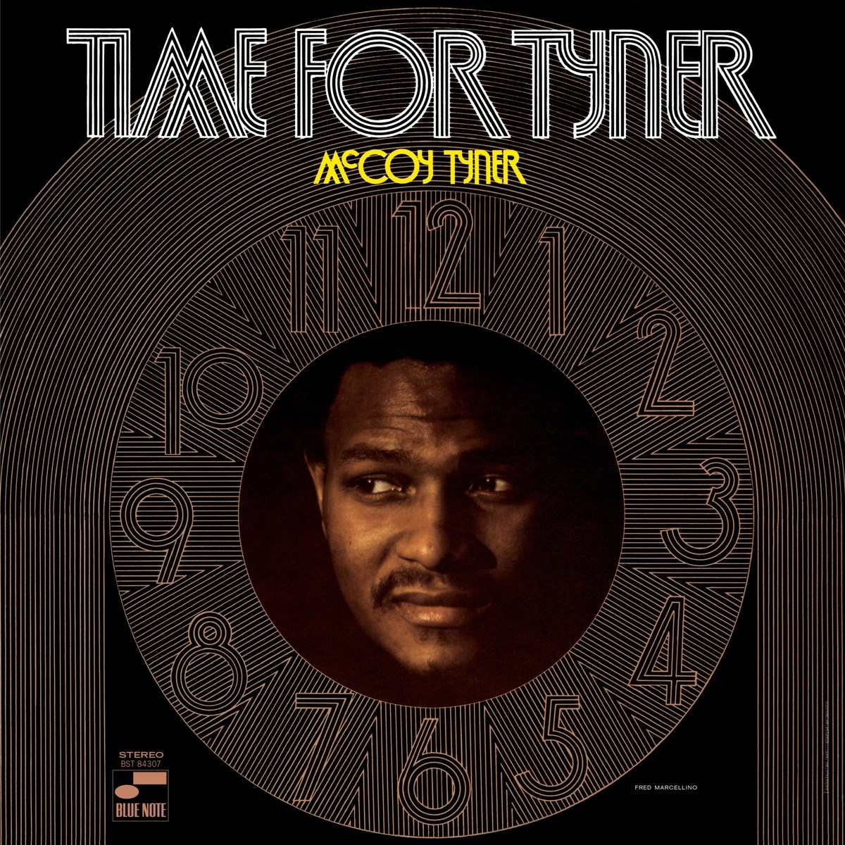 Copertina dell'album con ritratto di McCoy Tyner davanti a un quadrante e titolo.