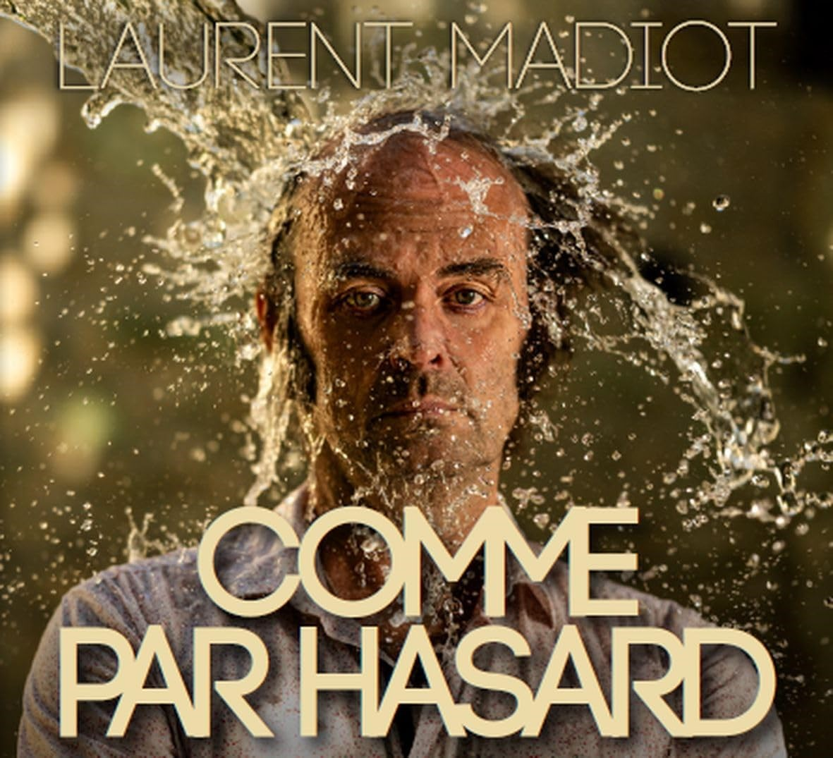 Uomo con acqua schizzata sul viso, LAURENT MADIOT, COMME PAR HASARD.