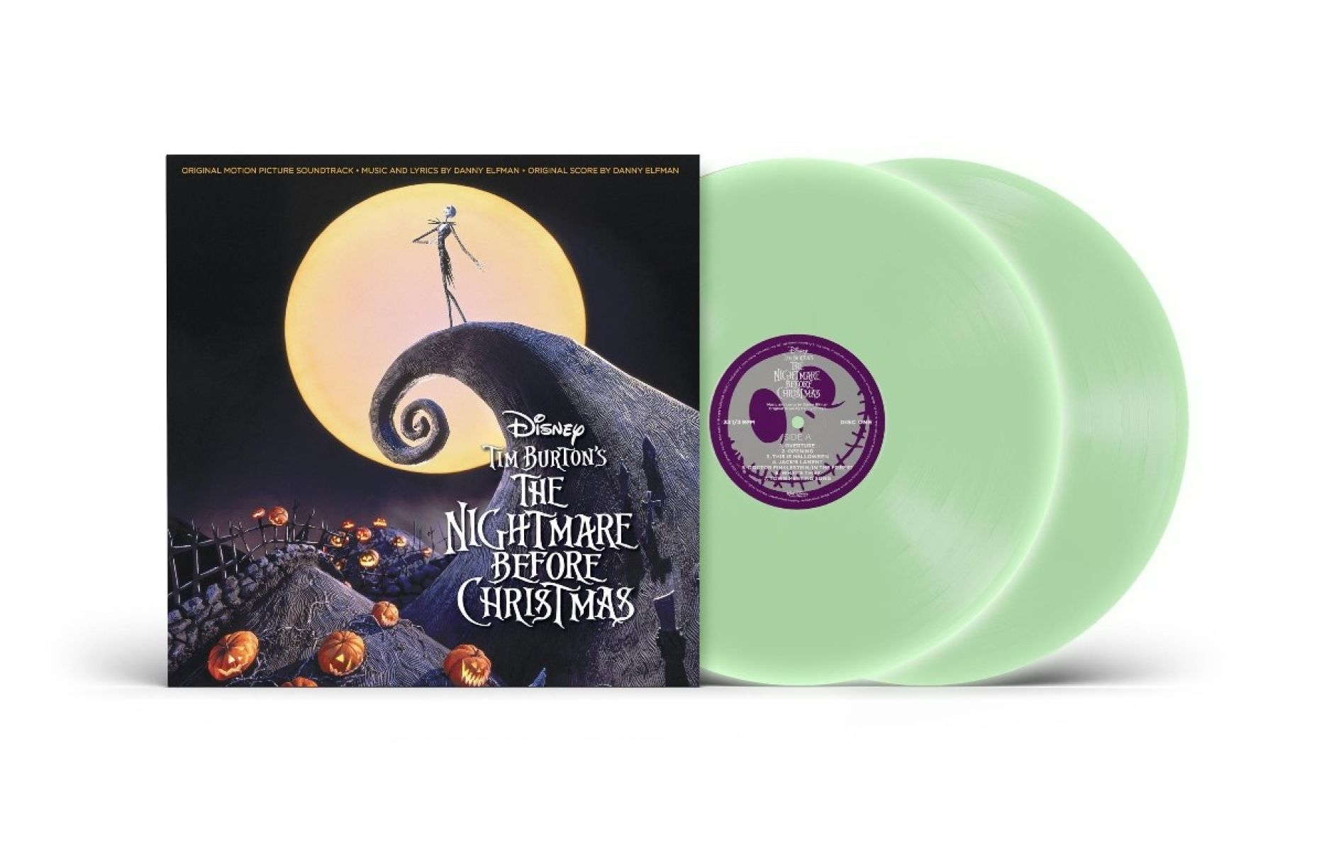 Copertina dell'album Nightmare Before Christmas di Tim Burton accanto a due dischi in vinile verde chiaro.