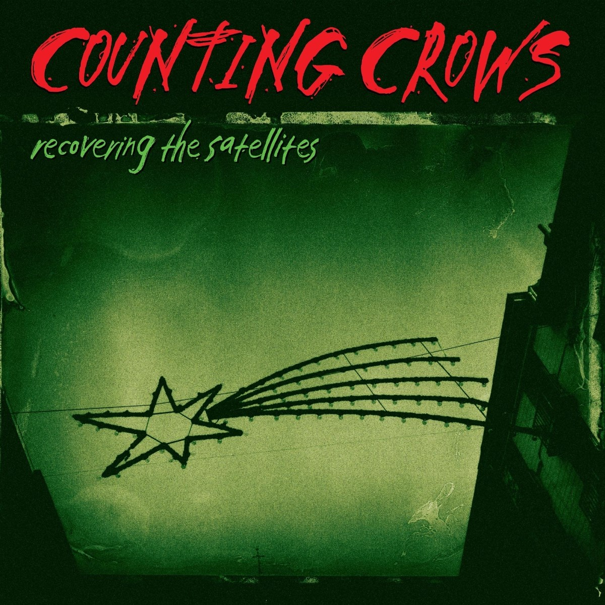 Copertina album Counting Crows: Formazione stellare a destra, toni verdi.