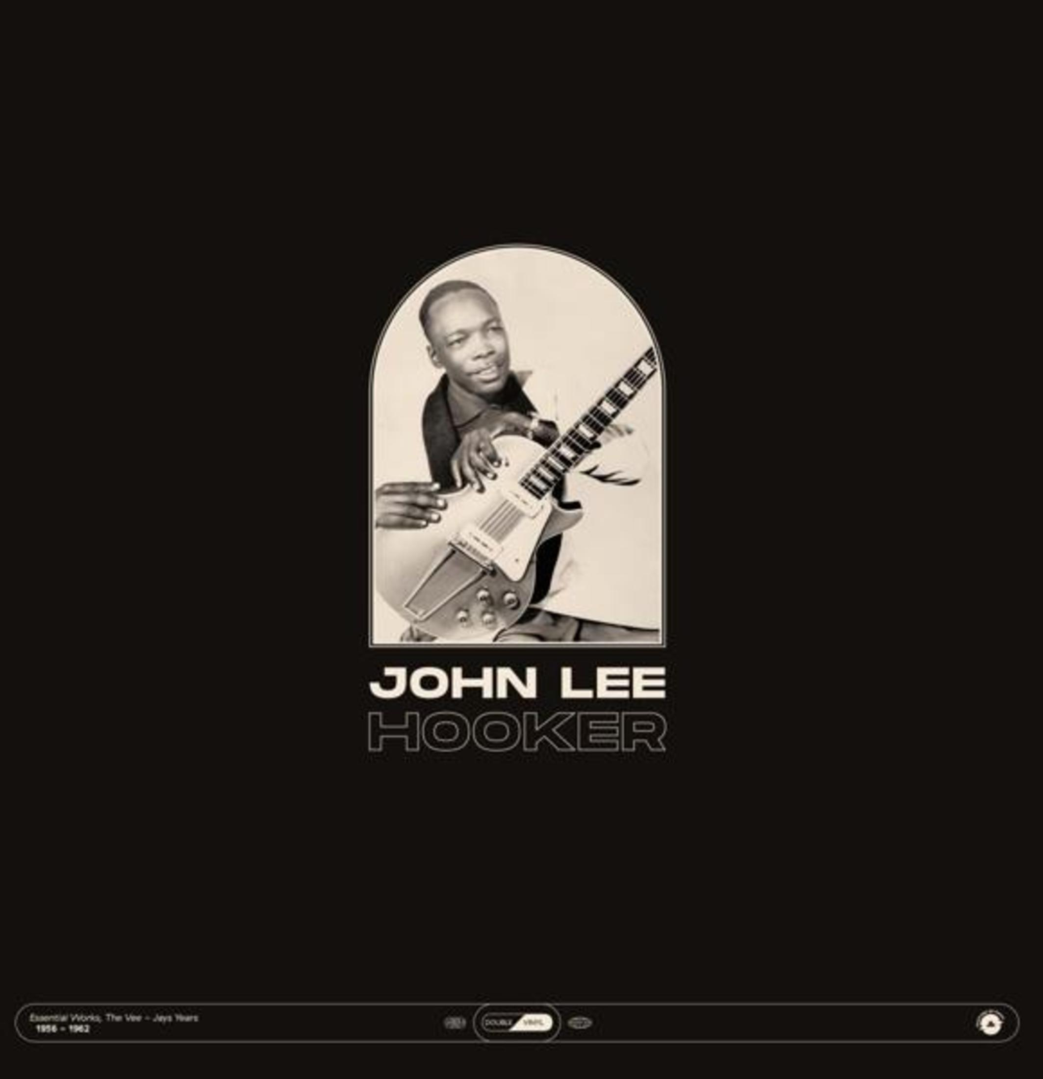 John Lee Hooker suona la chitarra in una foto d'archivio in bianco e nero.