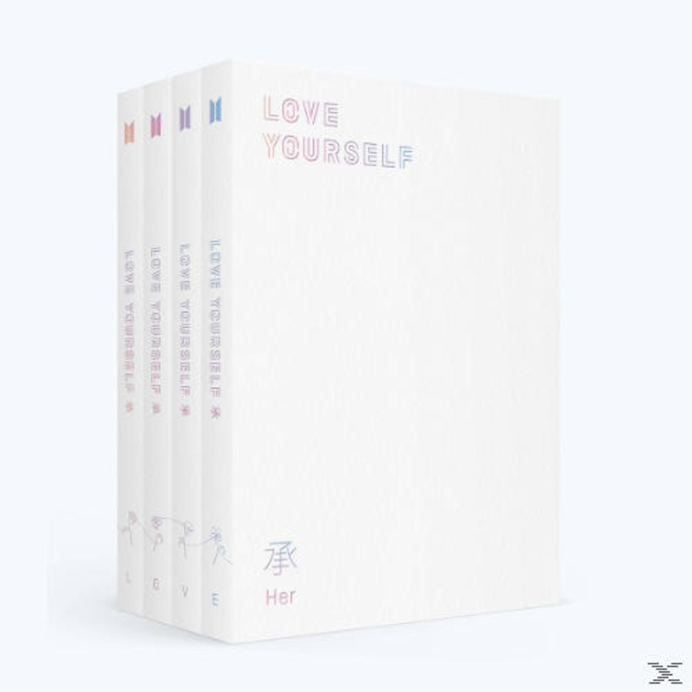 Quattro dorsi di libri bianchi con titoli e loghi colorati.