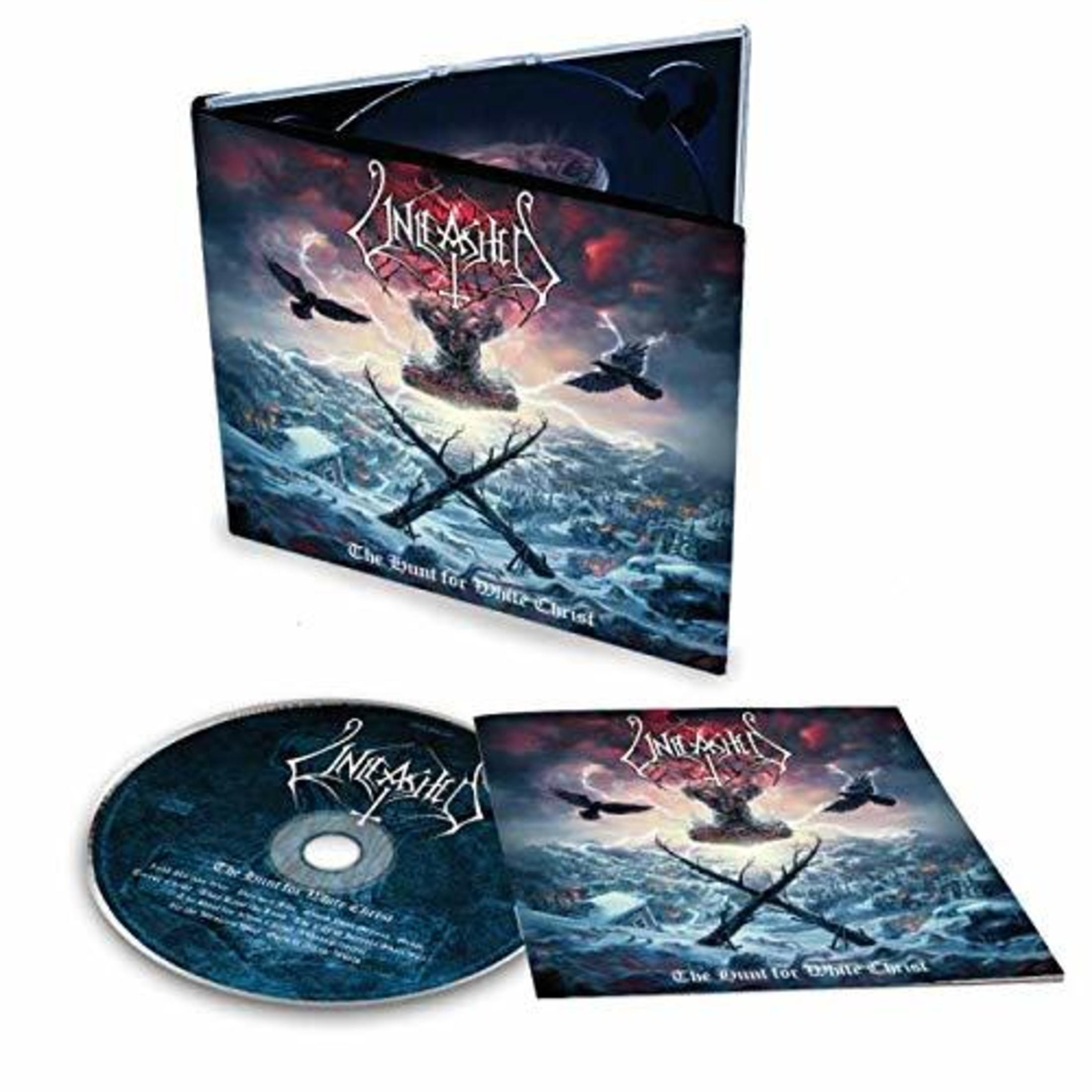CD e libretto Unleashed con paesaggio invernale tempestoso e due corvi.