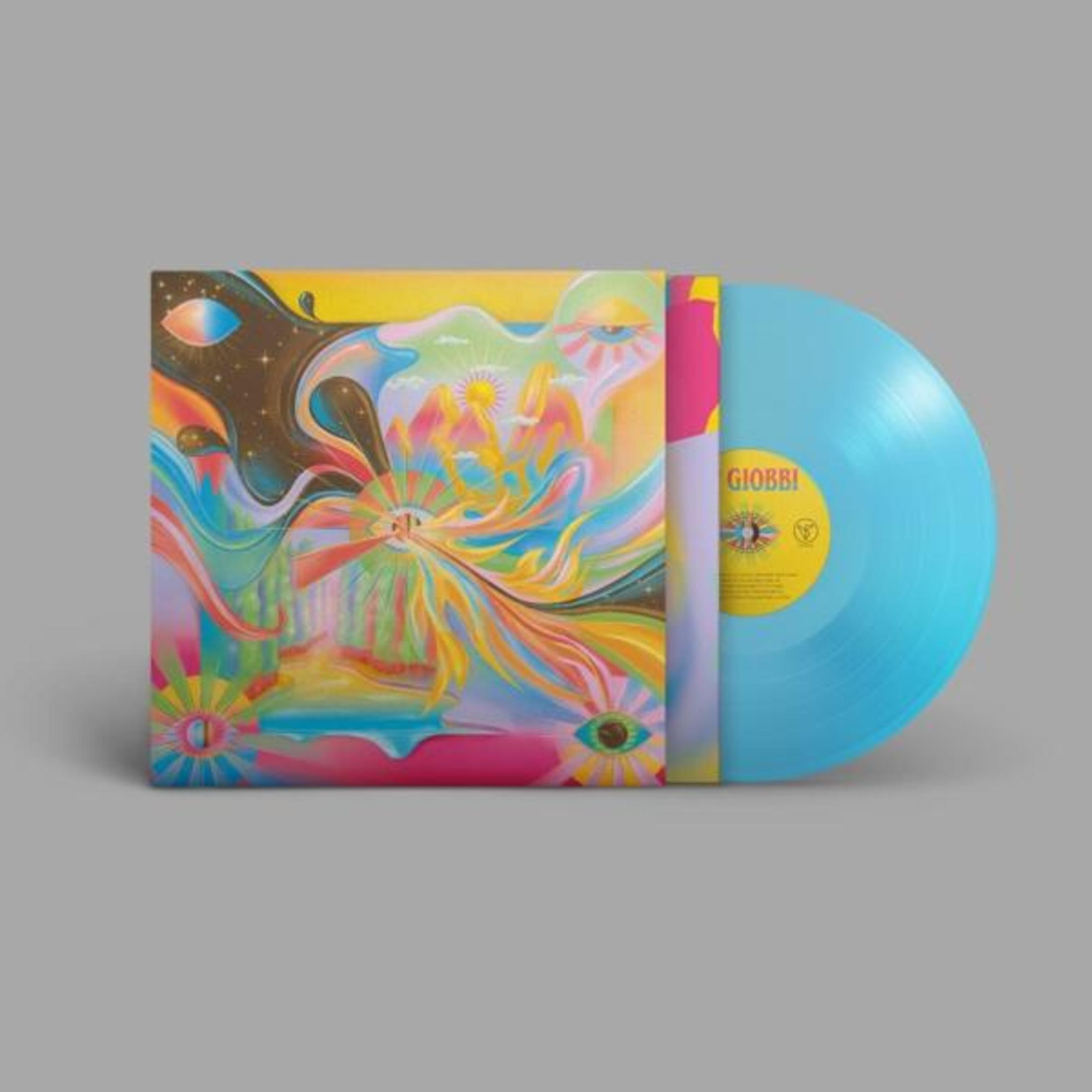 Disco in vinile azzurro con copertina psichedelica raffigurante occhi e montagne.