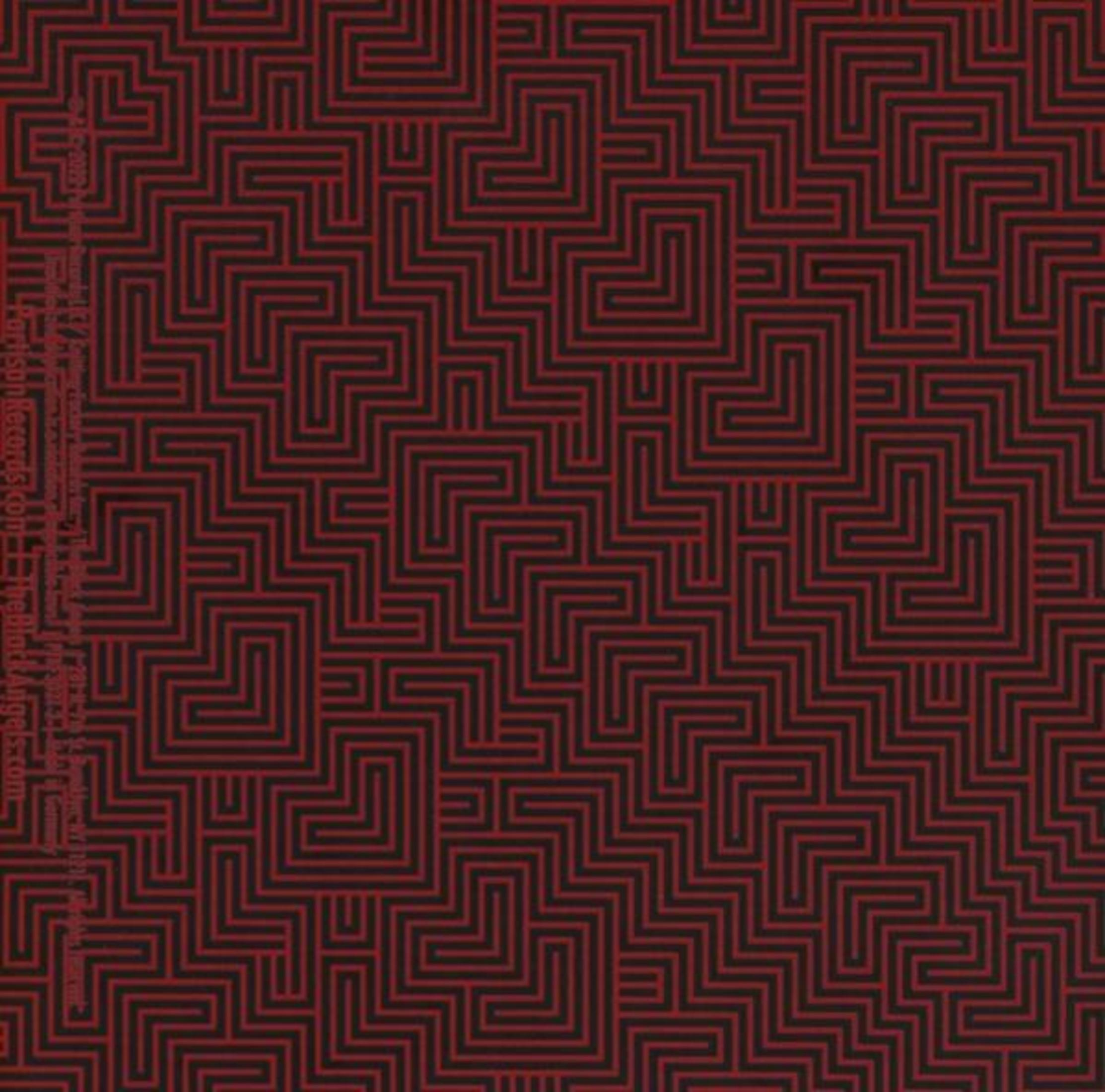 Un motivo a labirinto rosso su sfondo nero.