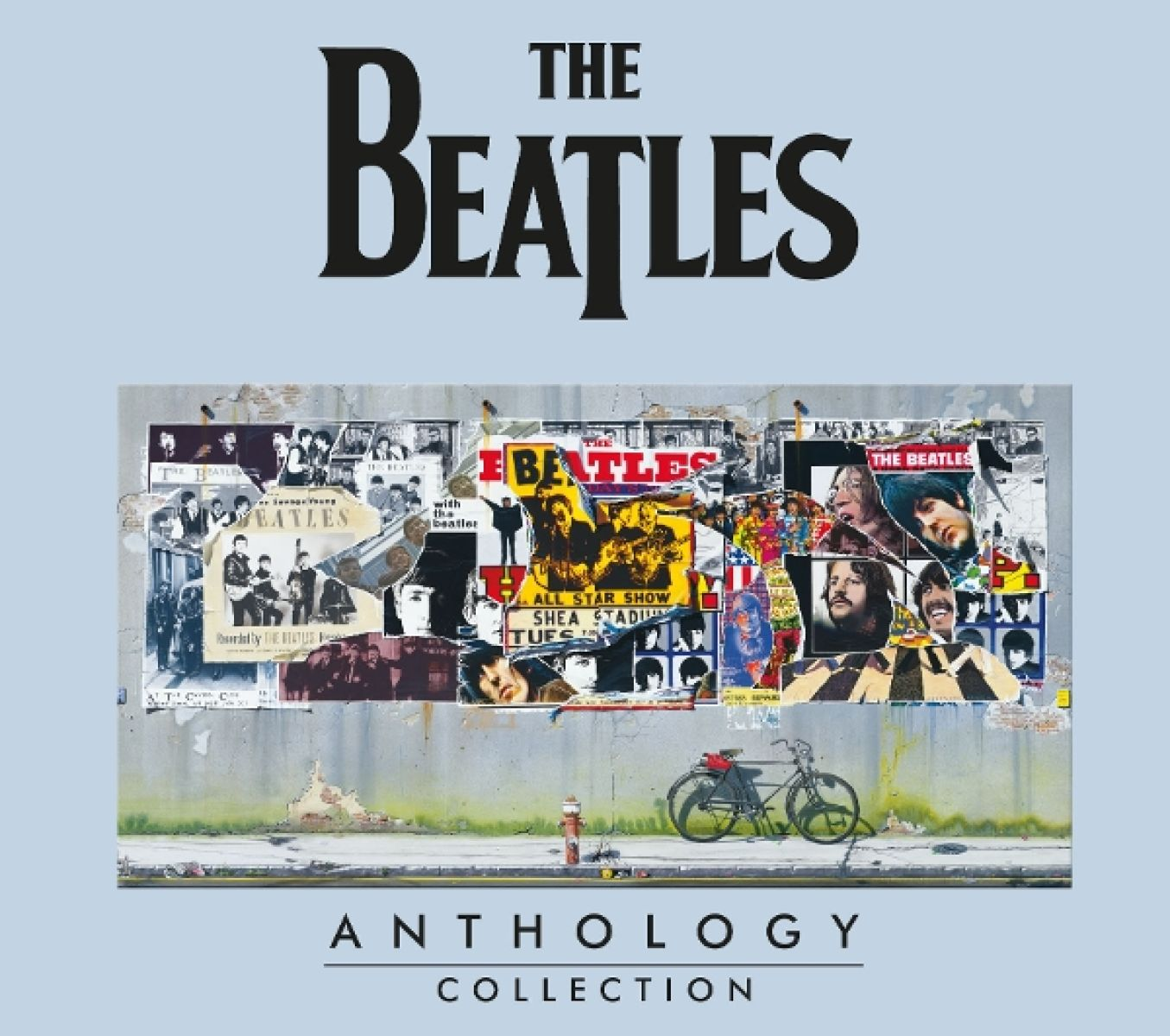 Anthology dei Beatles: Collage di poster e foto su muro, bici e idrante.