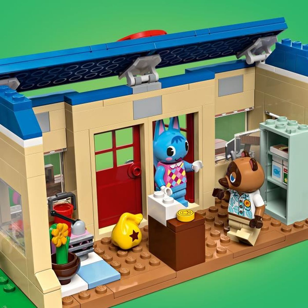 Een LEGO Animal Crossing scène met personages en een huis.