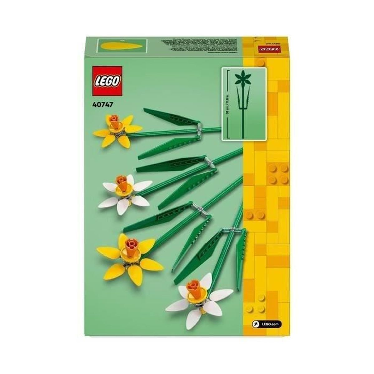 Pudełko LEGO z żółtymi i białymi narcyzami zbudowanymi z klocków.
