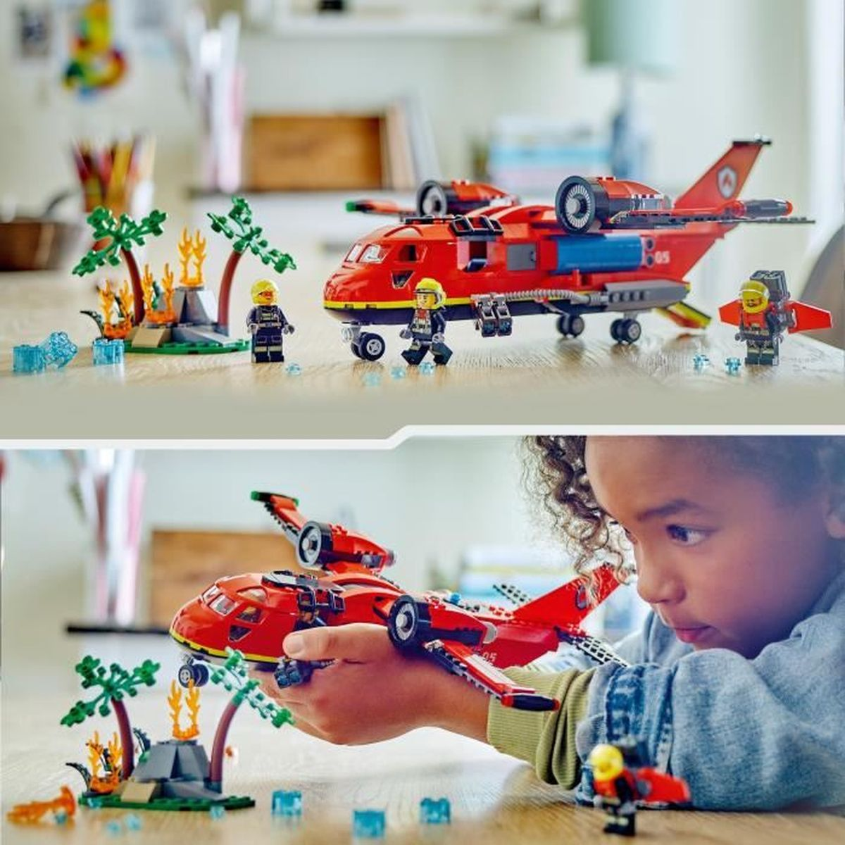 Avión de juguete rojo con figuras y volcán en llamas sobre la mesa.