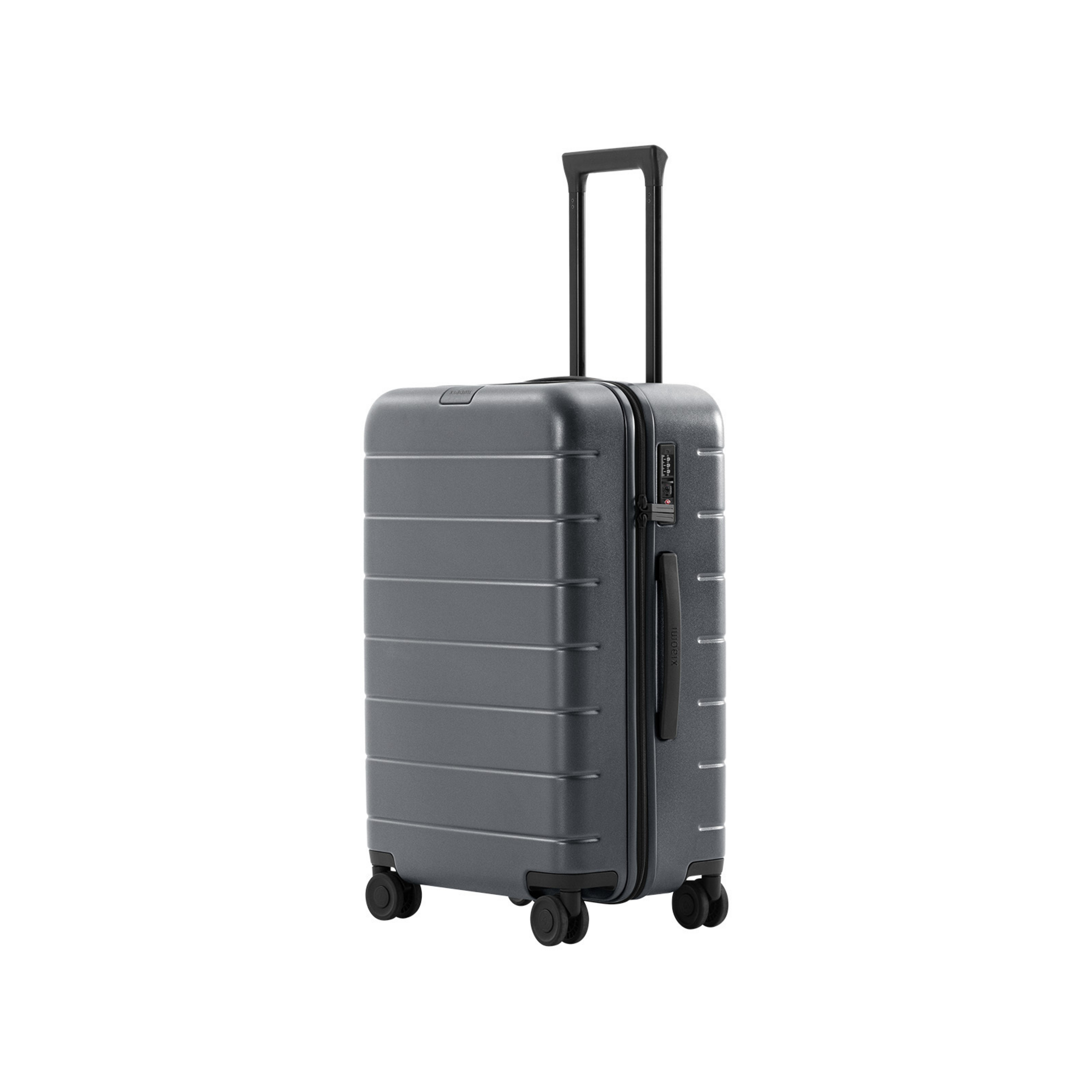 Une valise grise avec poignée extensible et roulettes, sur fond blanc.