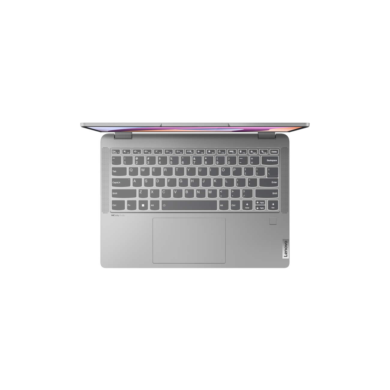 Srebrny laptop widziany z góry, widoczna klawiatura i touchpad.