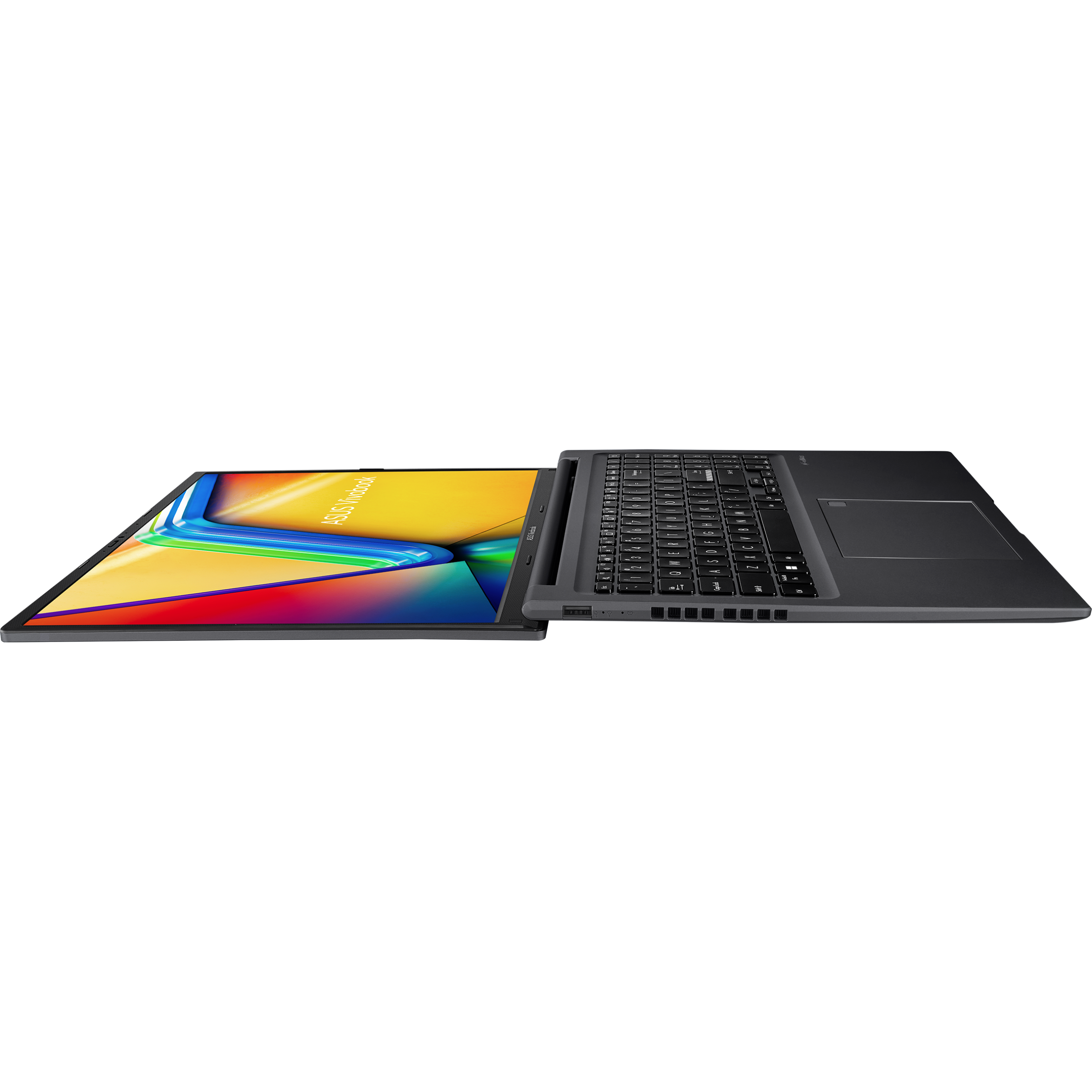 Ciemny laptop z podświetlanym ekranem leży na czarnej powierzchni.
