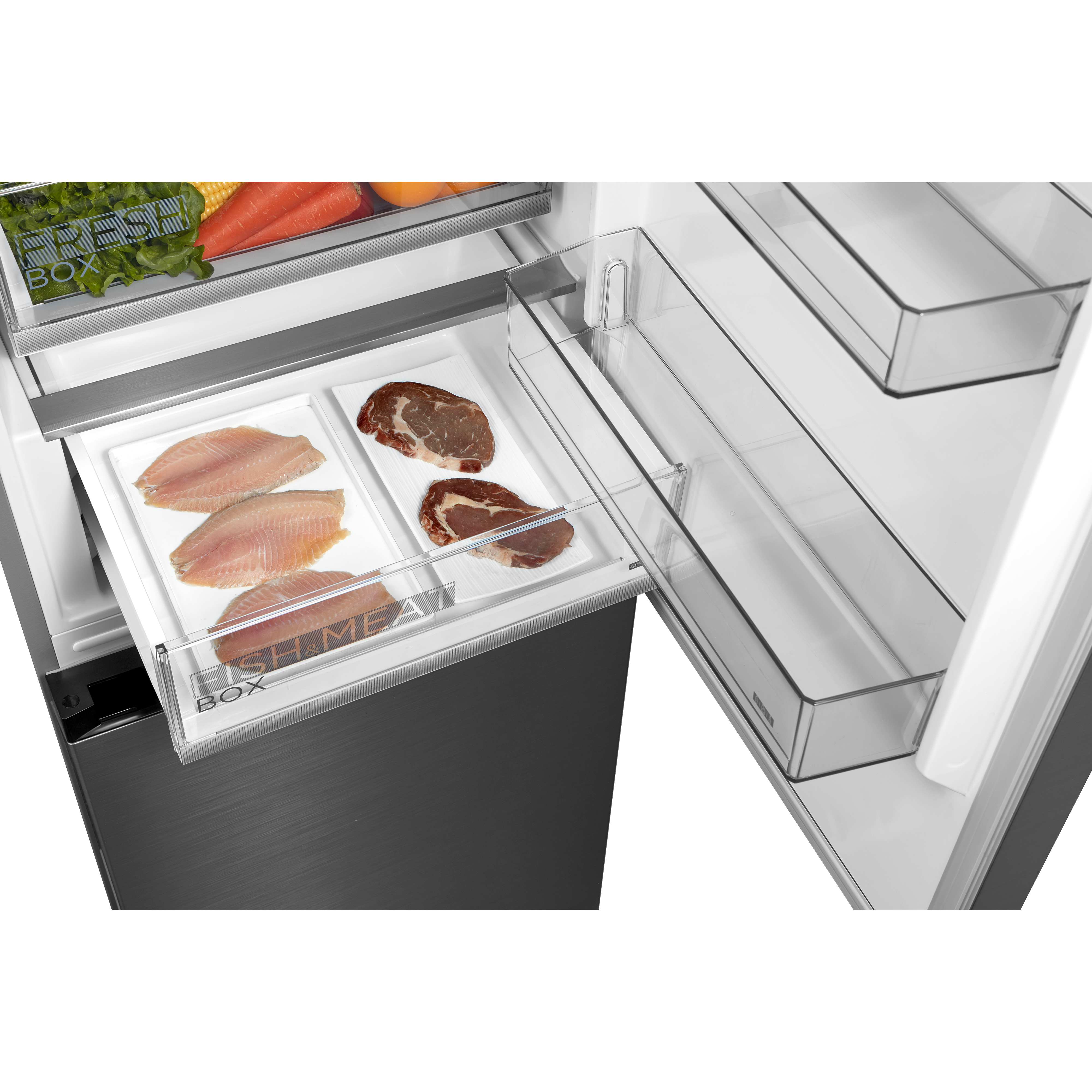 Frische Lebensmittel in Kühlschubladen: Fisch, Fleisch und Gemüse.