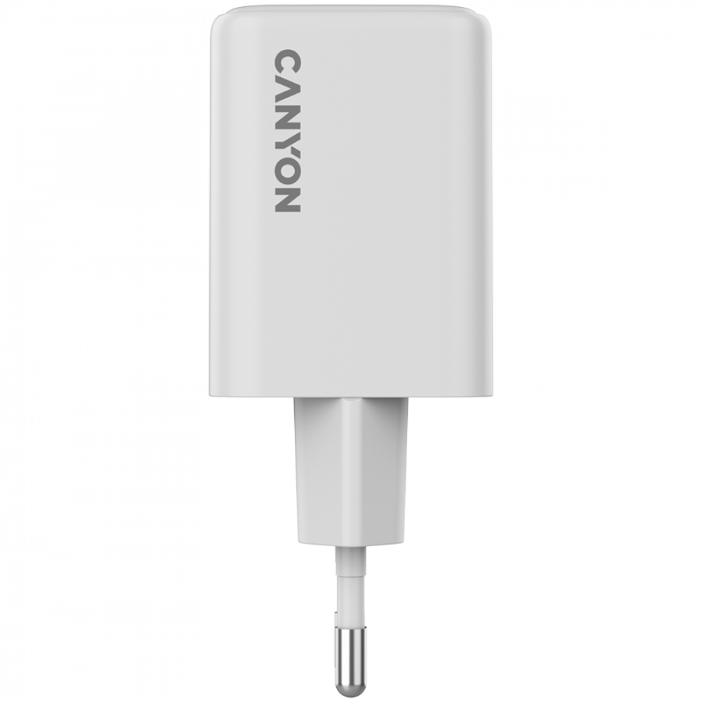 Un adattatore di corrente Canyon bianco con pin argentati.