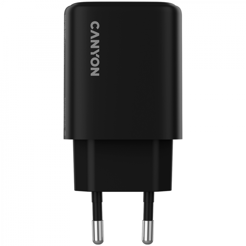 Un adattatore di corrente Canyon nero con due pin metallici.