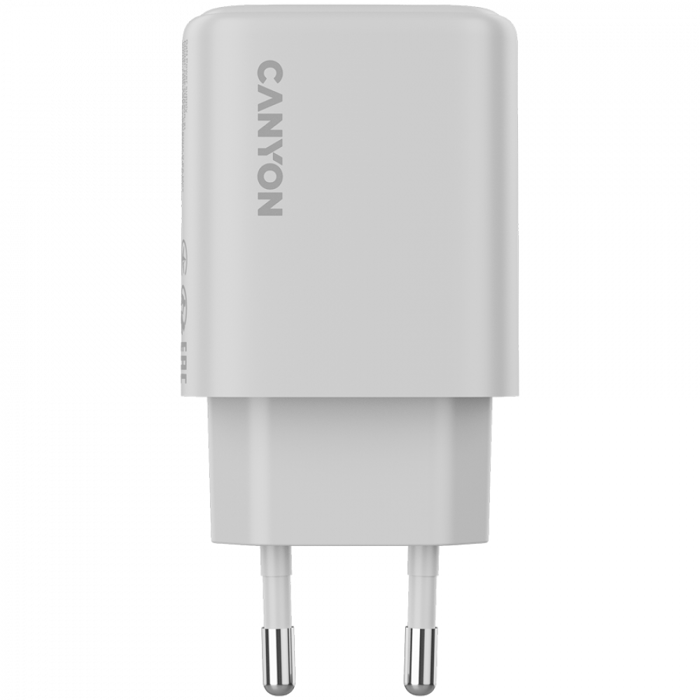 Biały adapter zasilający Canyon z dwoma metalowymi bolcami.