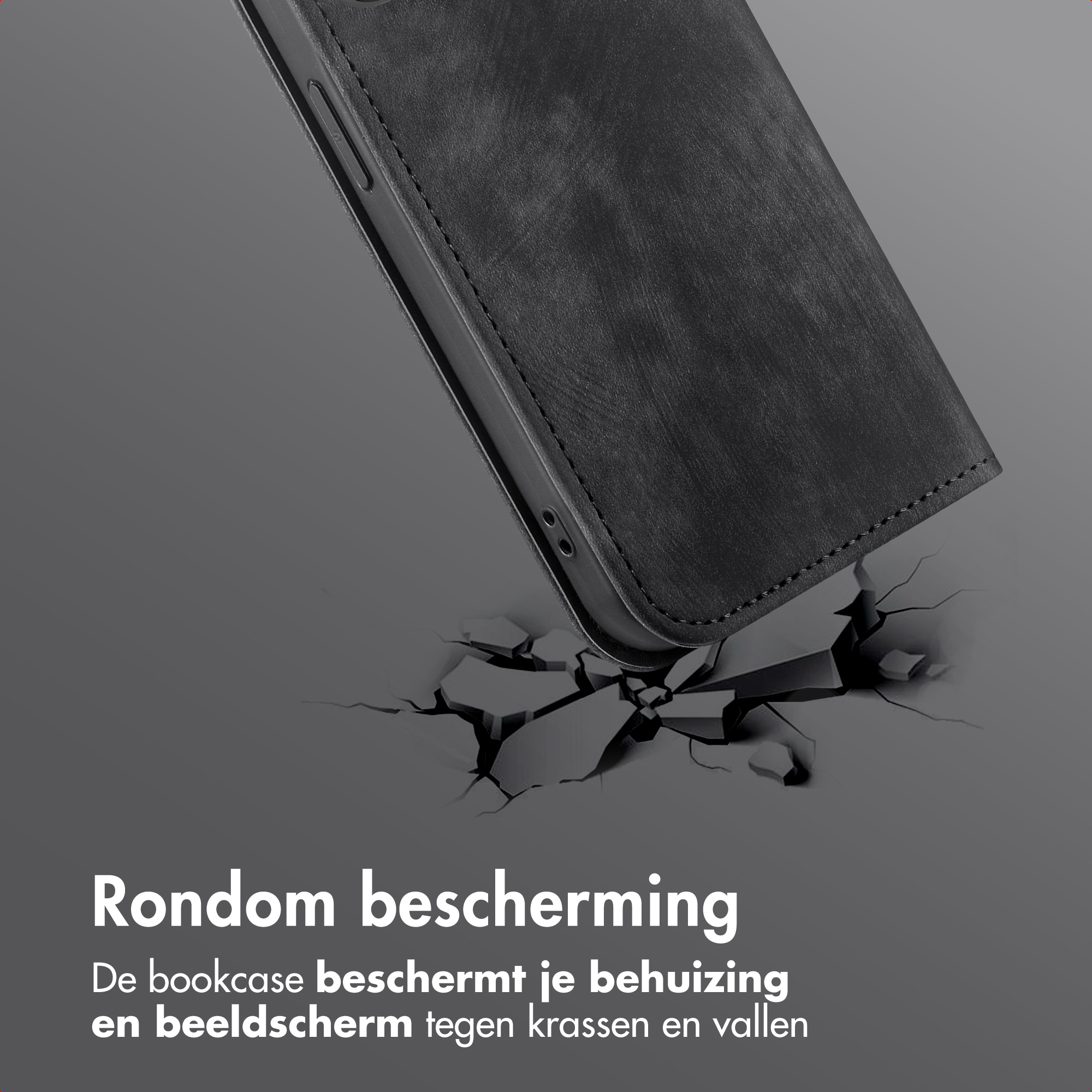 Étui de téléphone noir sur sol fissuré, montrant la résistance aux chocs.