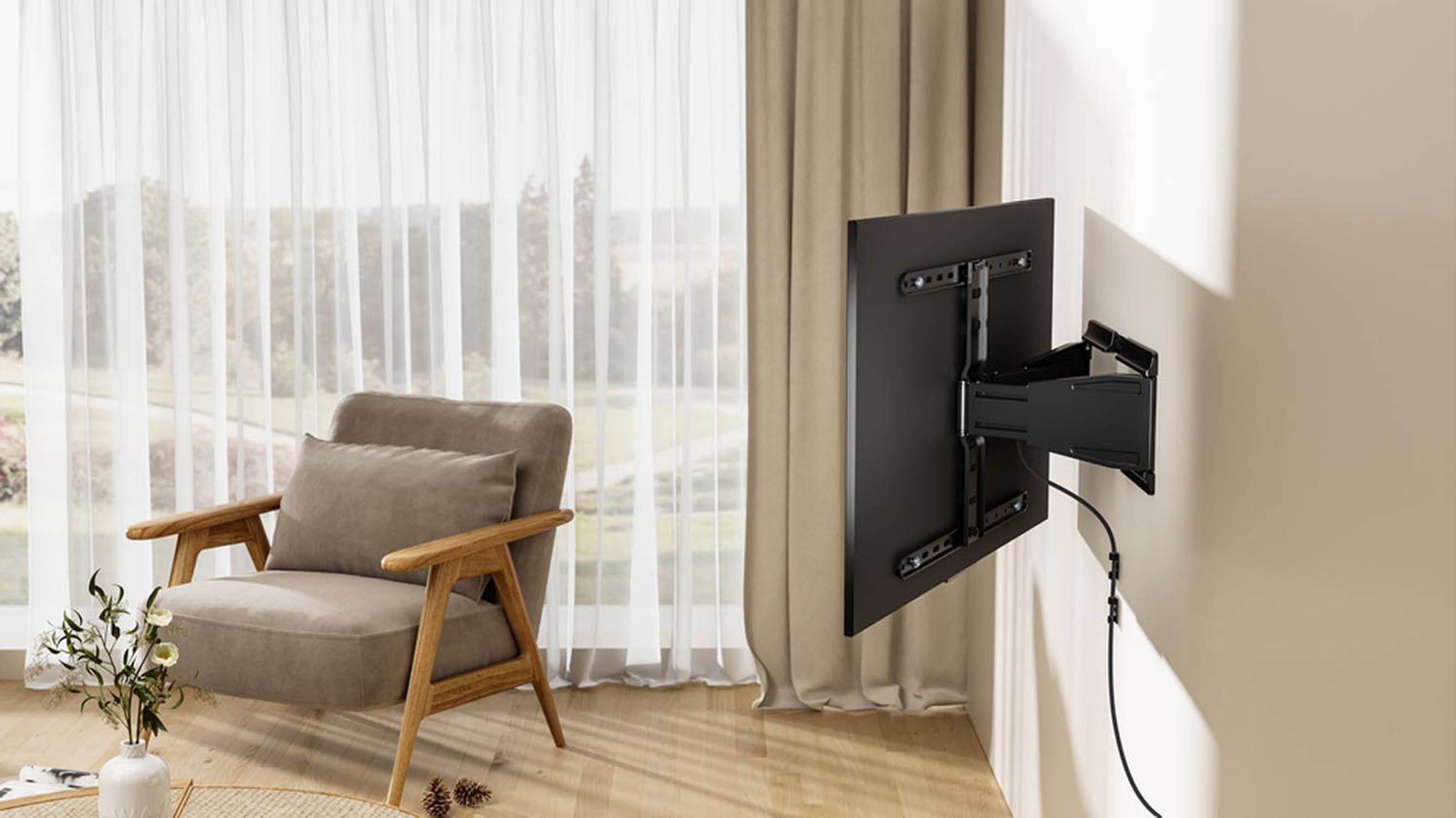 A chair sits next to a wall-mounted TV bracket. White curtains in the background.