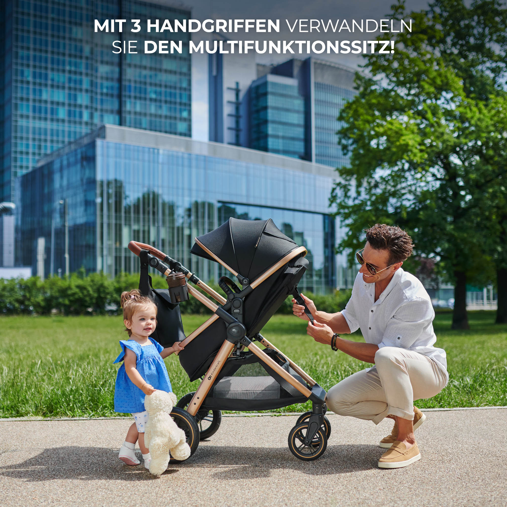Mann und Kind mit Kinderwagen vor modernen Gebäuden.