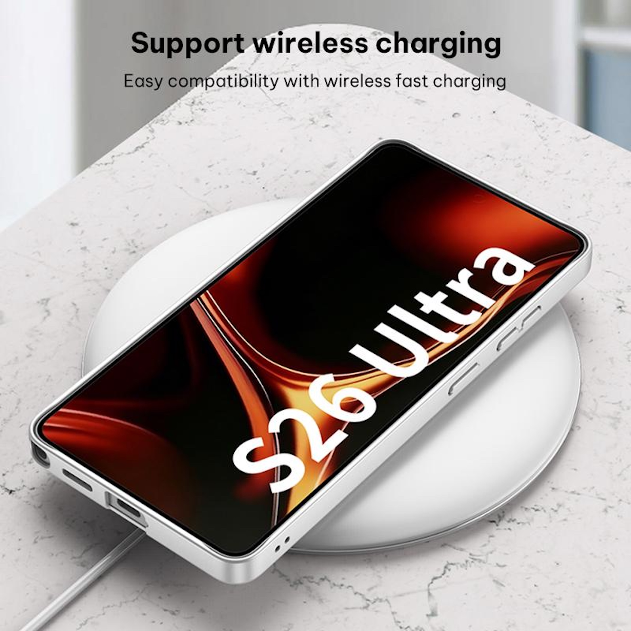 Un smartphone plateado con "S26 Ultra" yace sobre una base de carga blanca.