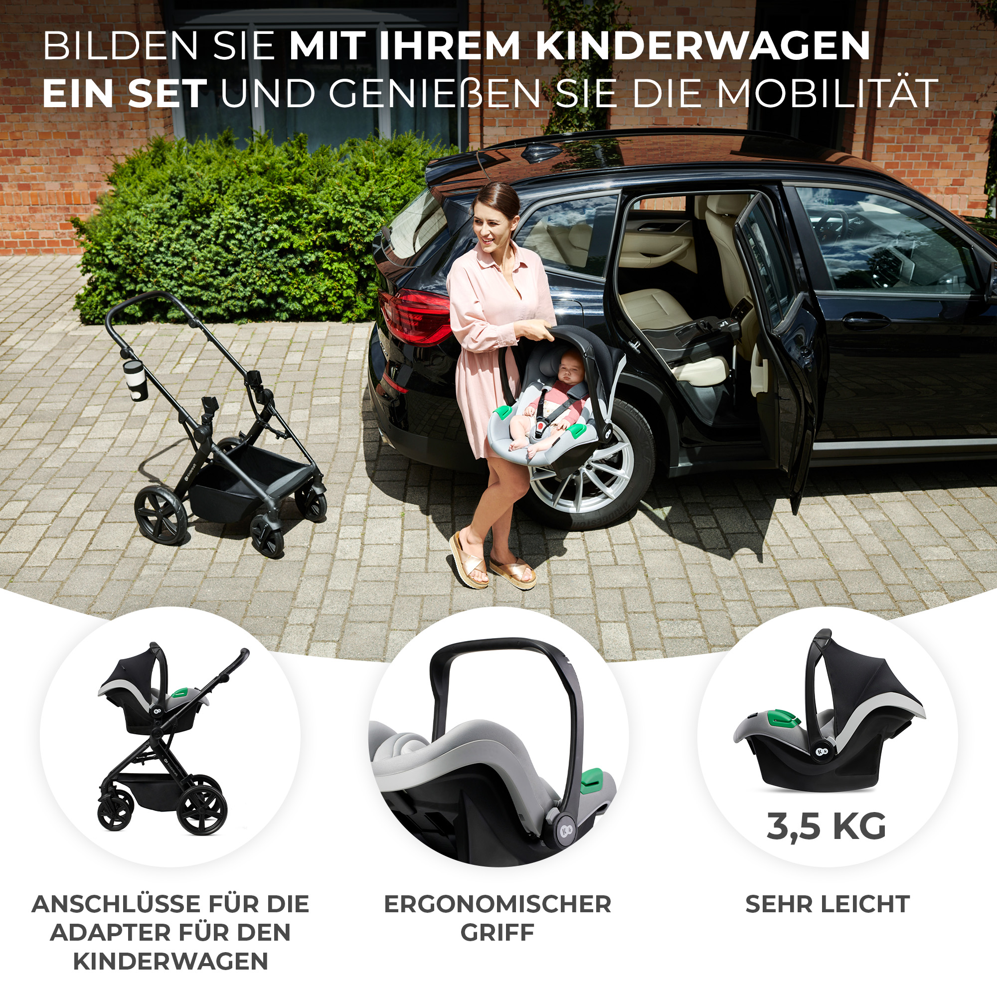 Frau mit Baby im Kindersitz neben schwarzem Auto und Kinderwagen.
