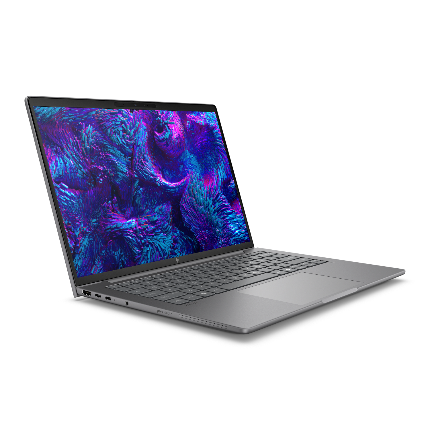 Szary laptop z purpurowo-niebieską tapetą abstrakcyjną na ekranie.