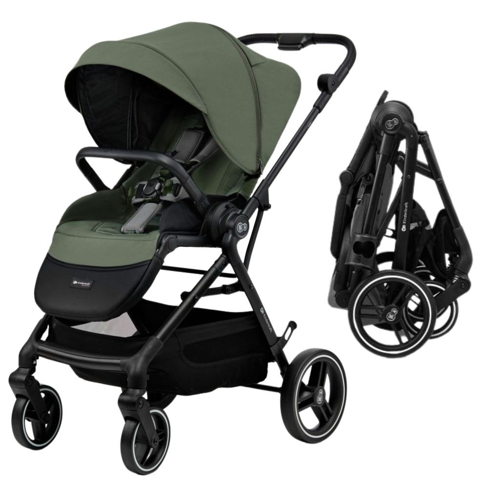 Ein grüner und schwarzer Kinderwagen ist entfaltet, neben einem zusammengeklappten schwarzen Kinderwagen.