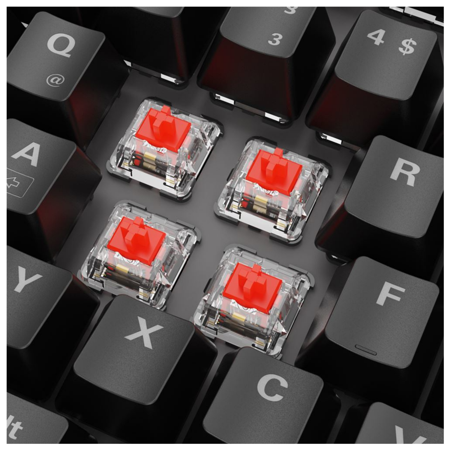 Four red mechanical keyboard switches with clear casings on a black keyboard.