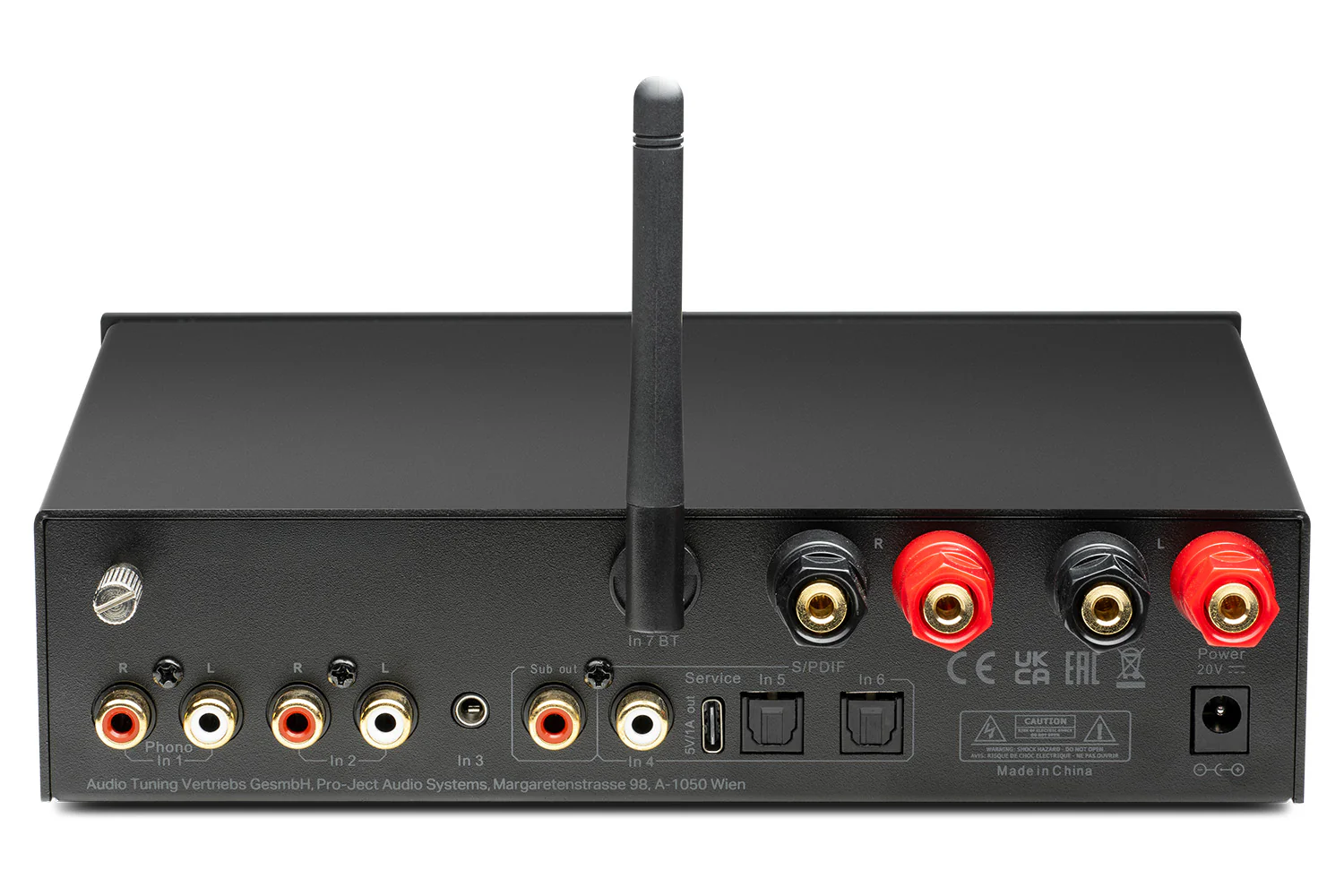 Tył czarnego urządzenia audio z portami, anteną i certyfikatami.