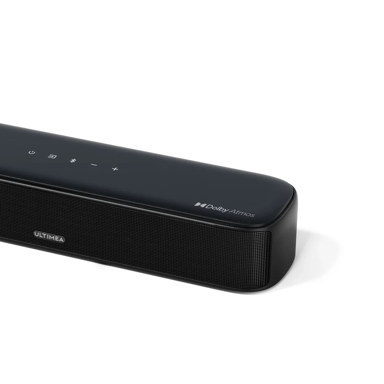 Une barre de son noire avec grille avant texturée et commandes sur le dessus. Logo Dolby Atmos visible.