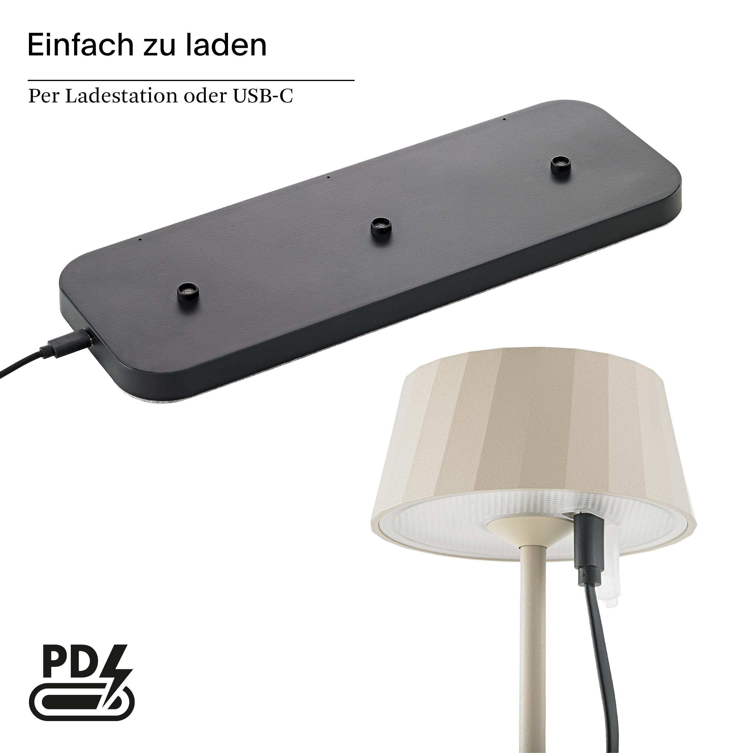 Schwarze Ladestation mit USB-C-Anschluss und beige Lampe mit Kabel.