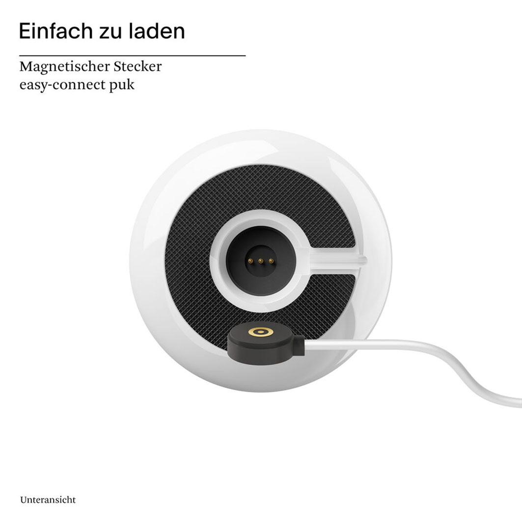 Weiße Ladeeinheit mit schwarzem Gitter und magnetischem Stecker.