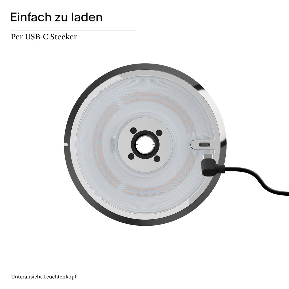 Runder Lampenkopf mit USB-C-Anschluss, lädt über Kabel.