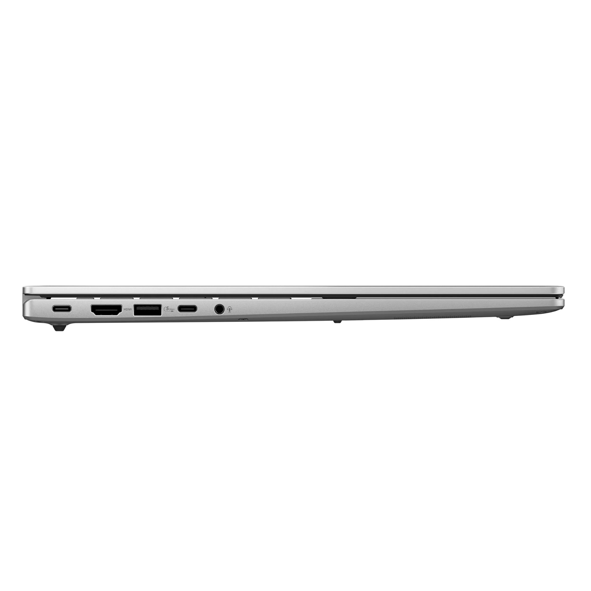 Gümüş laptop yan görünümü, bağlantı noktaları: USB-C, HDMI, USB-A, ses jakı.