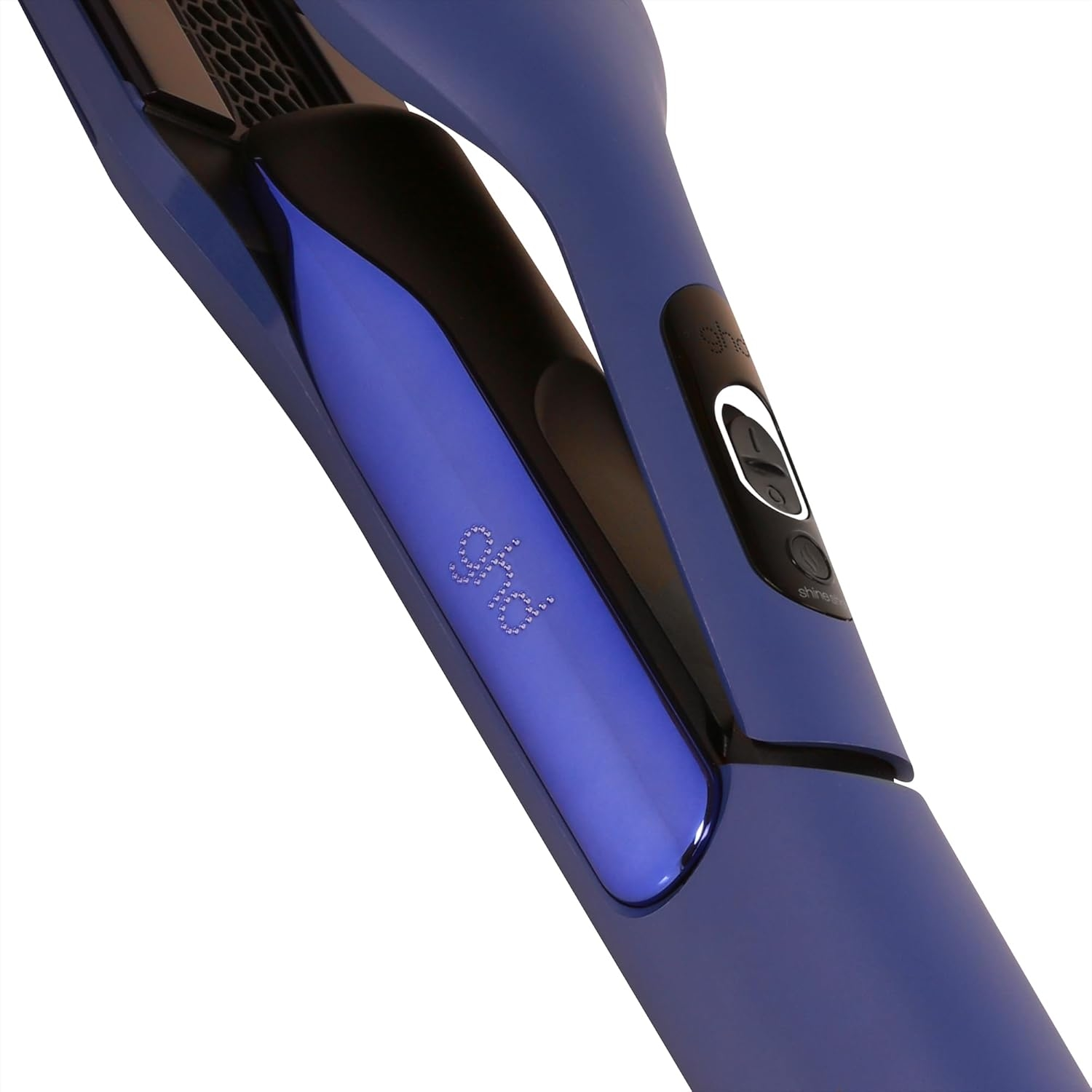 Piastra per capelli blu con logo GHD e controlli su sfondo bianco.