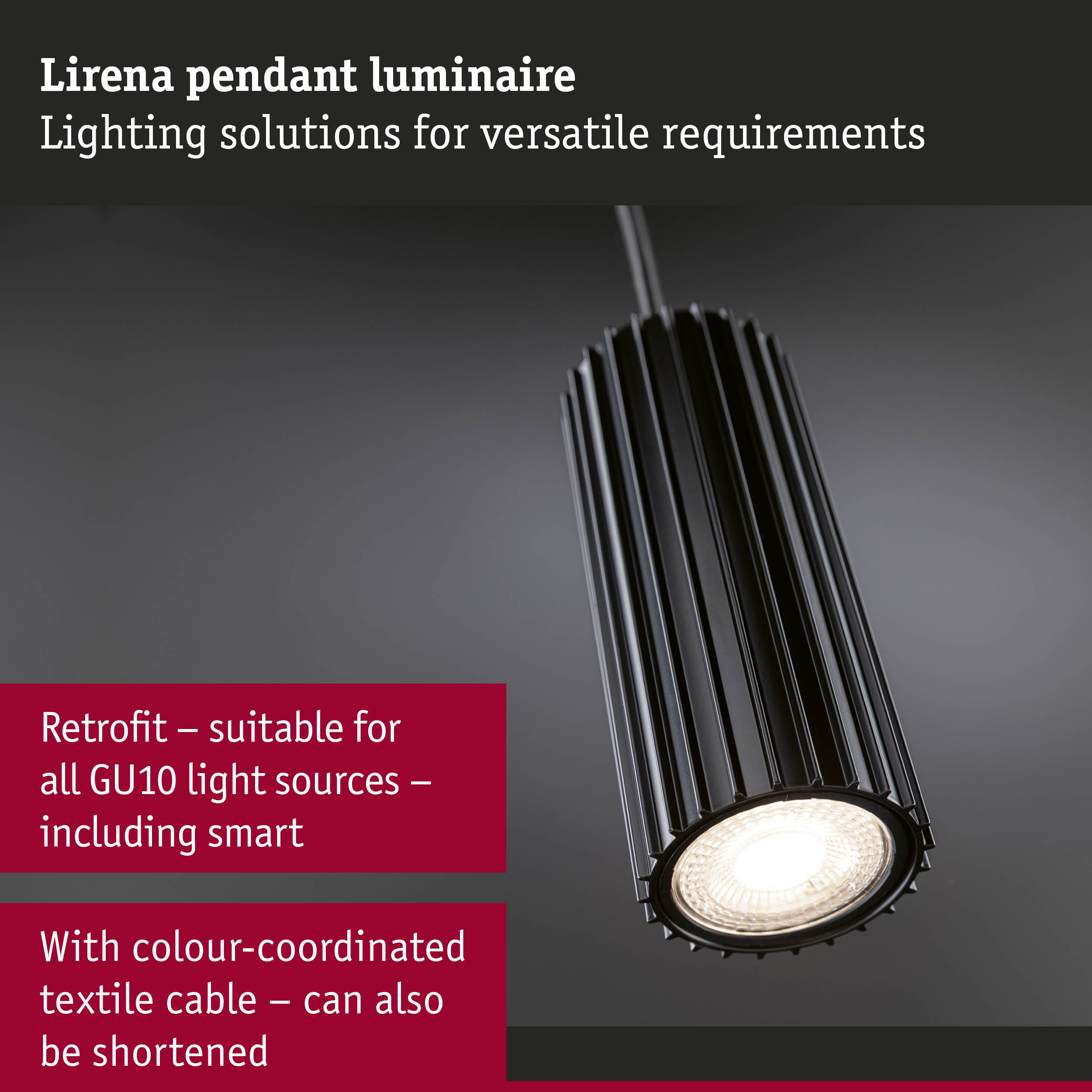 Plafonnier noir côtelé avec une ampoule GU10 allumée.