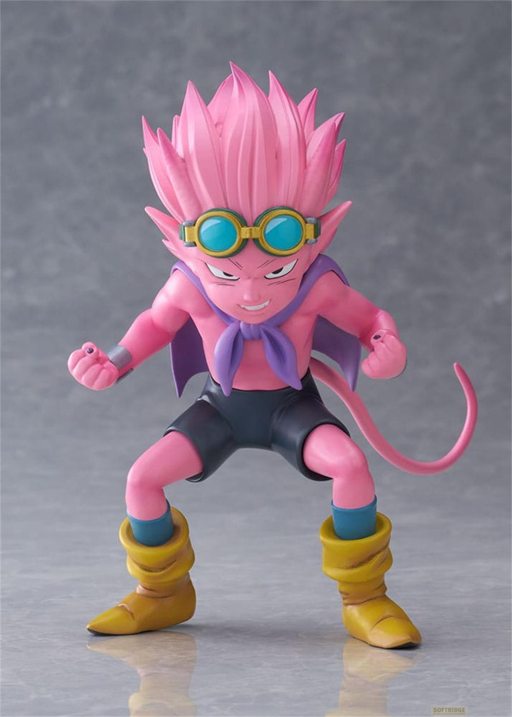 Una figura rosa con pelo rosa puntiagudo, gafas azules y botas amarillas.